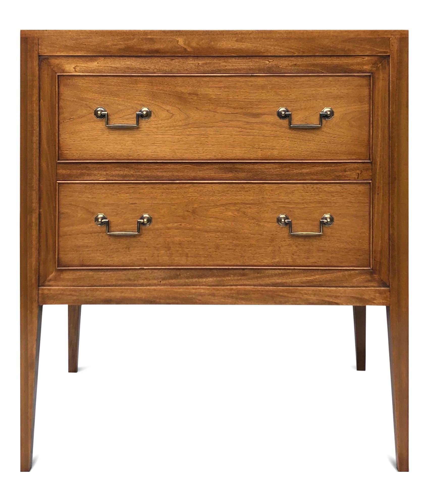 A pair of modern two-drawer walnut chests.
Manufactured by Garners, (Est 1966)
The tops with matching striped grains & fine bead. Two beaded drawers resting on slender tapering legs. Squared brass handles. Antique straw finish.

Various finishes