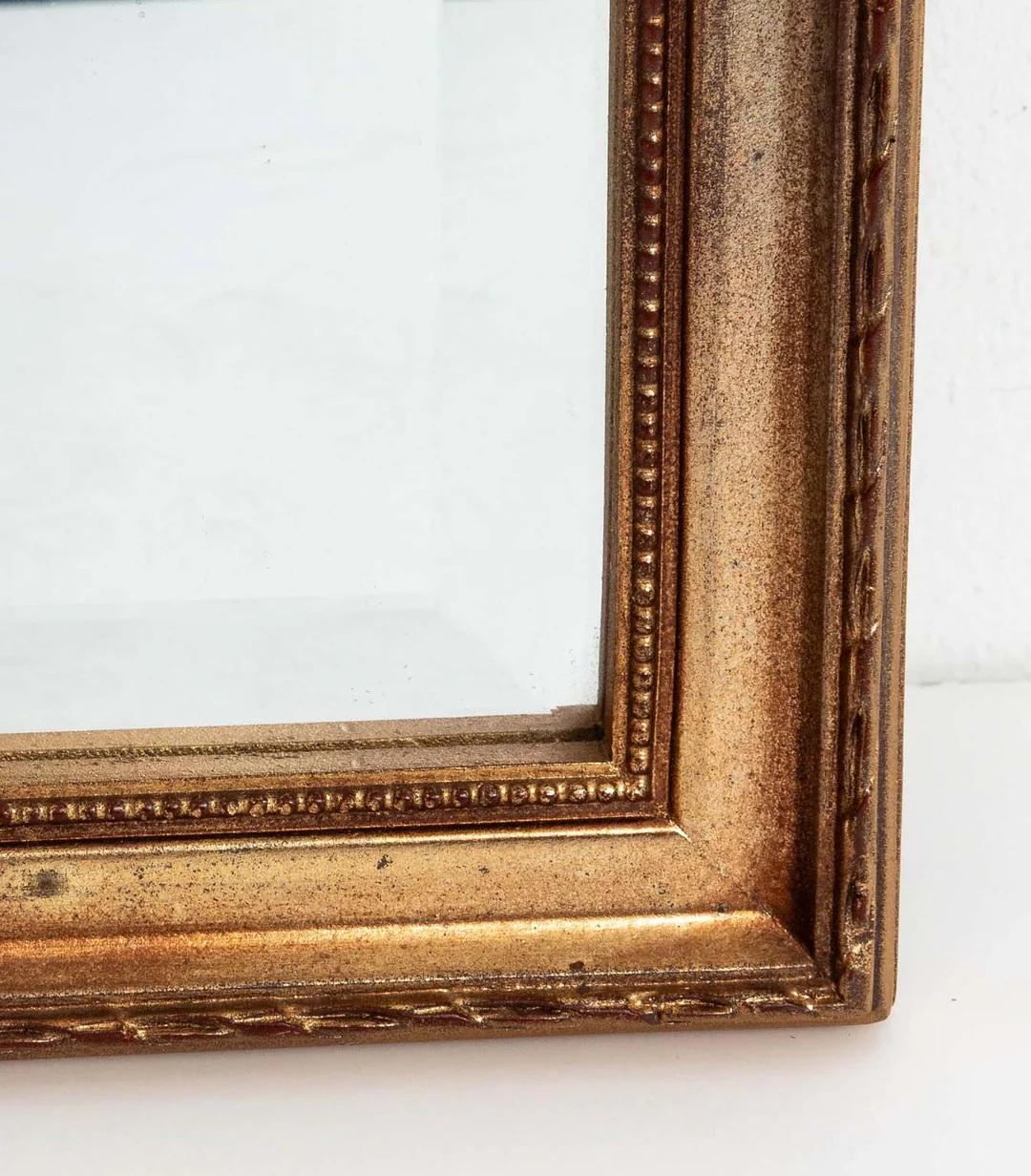 Pareja De Espejos Biselados Dorados Con Borla en venta 1