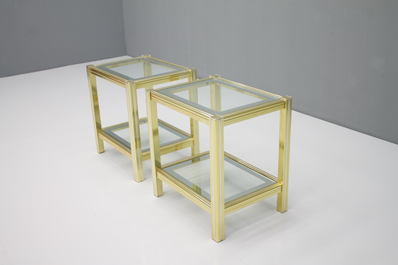 Pair of bi-color side tables in brass, glass, and chrome 1970s

Very good condition.