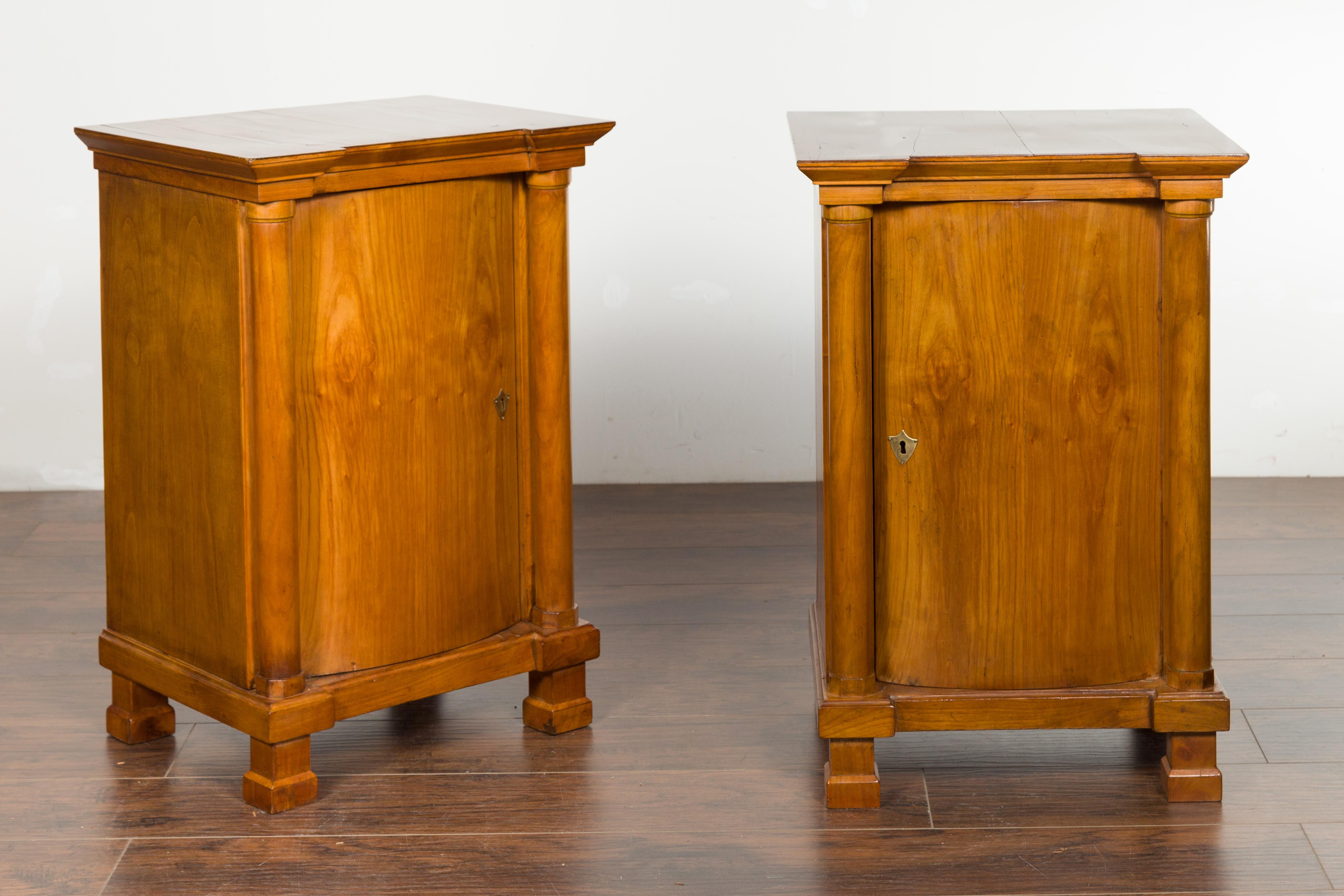 Austrian Pair of Biedermeier 1840s Walnut Cabinets with Bombé Doors and Semi-Columns
