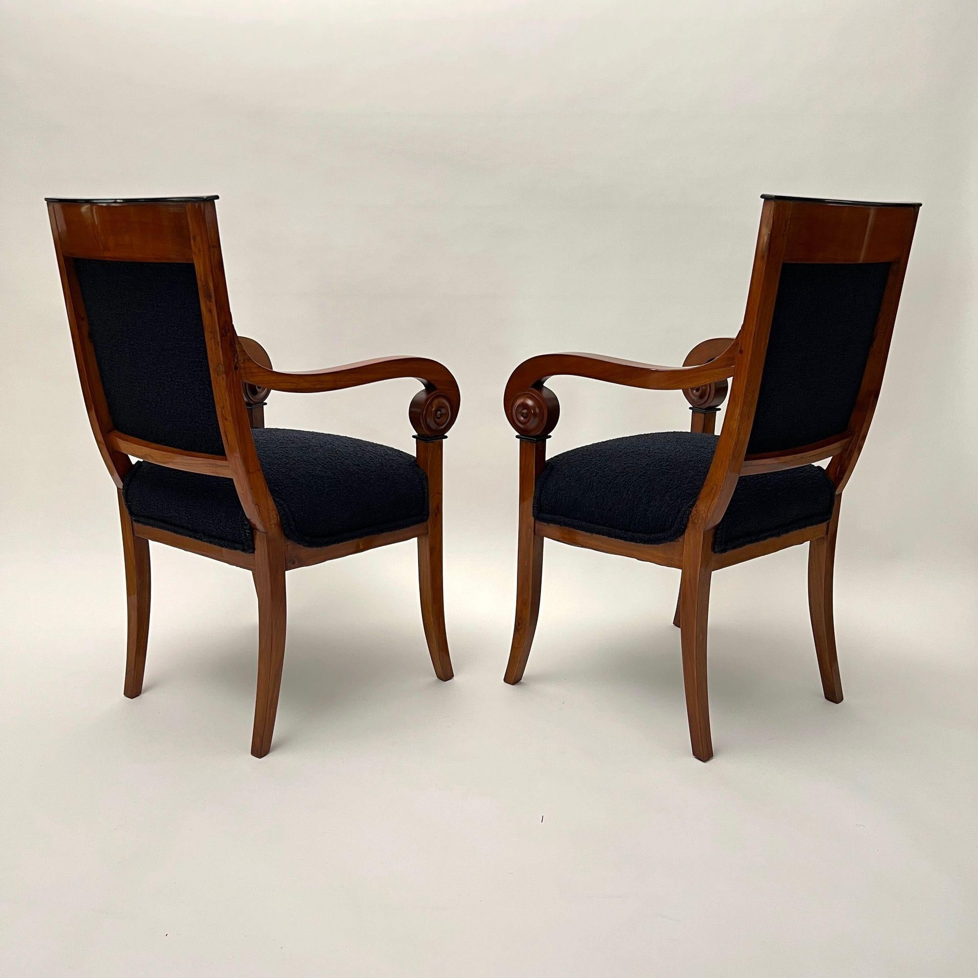 Pair of Biedermeier Armchairs, Cherry Wood, Black Boucle, France circa 1820 For Sale 1