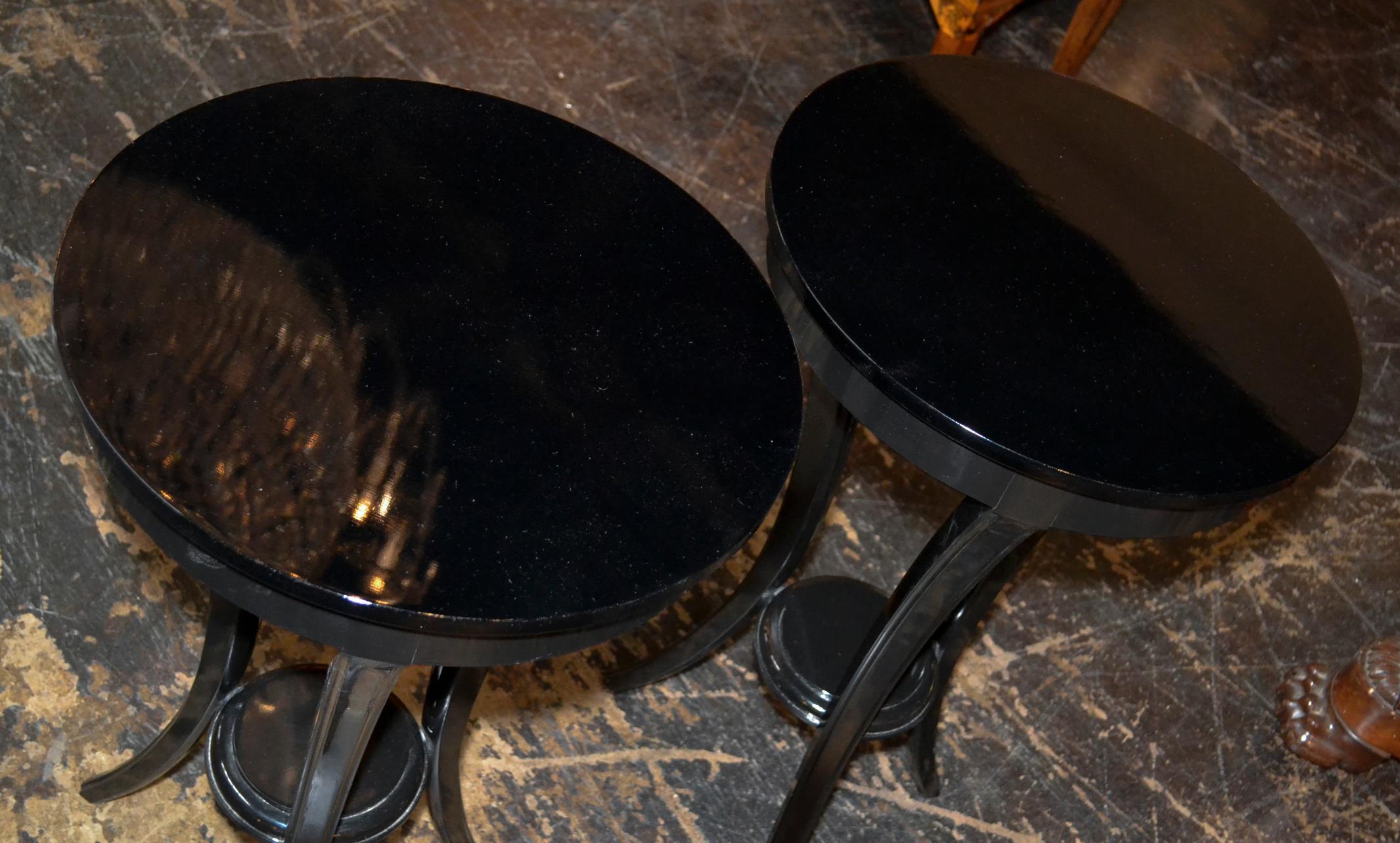 Great pair of Biedermeier style black lacquered 3-leg side tables.