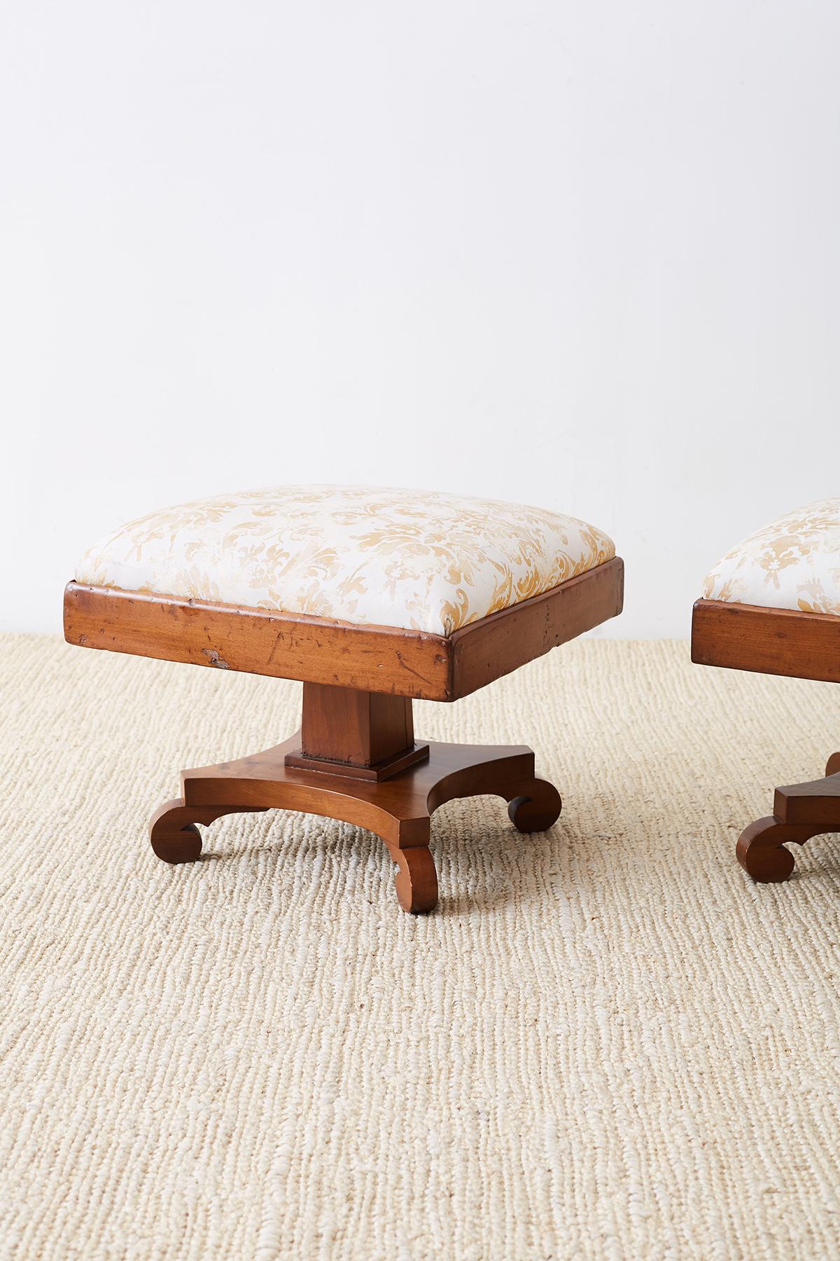 European Pair of Biedermeier Carved Footstools with Fortuny Upholstery