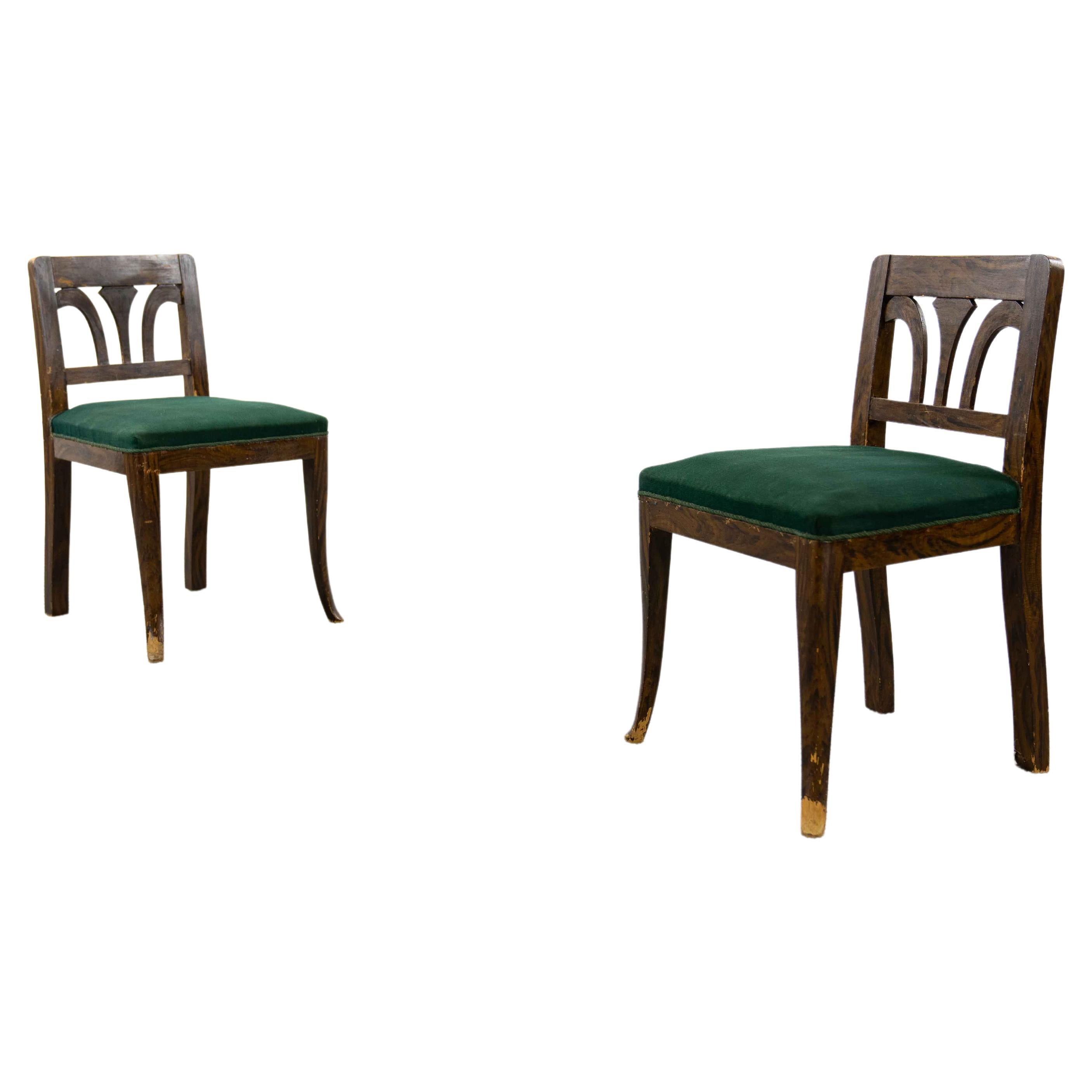 Pair of rural Biedermeier chairs, Germany ca. mid 19 century. The chairs are definitely in need of restoration, but still charming. The chairs appear quite small, but they are no kids chairs. - please compare to the Eames chair. These chairs are