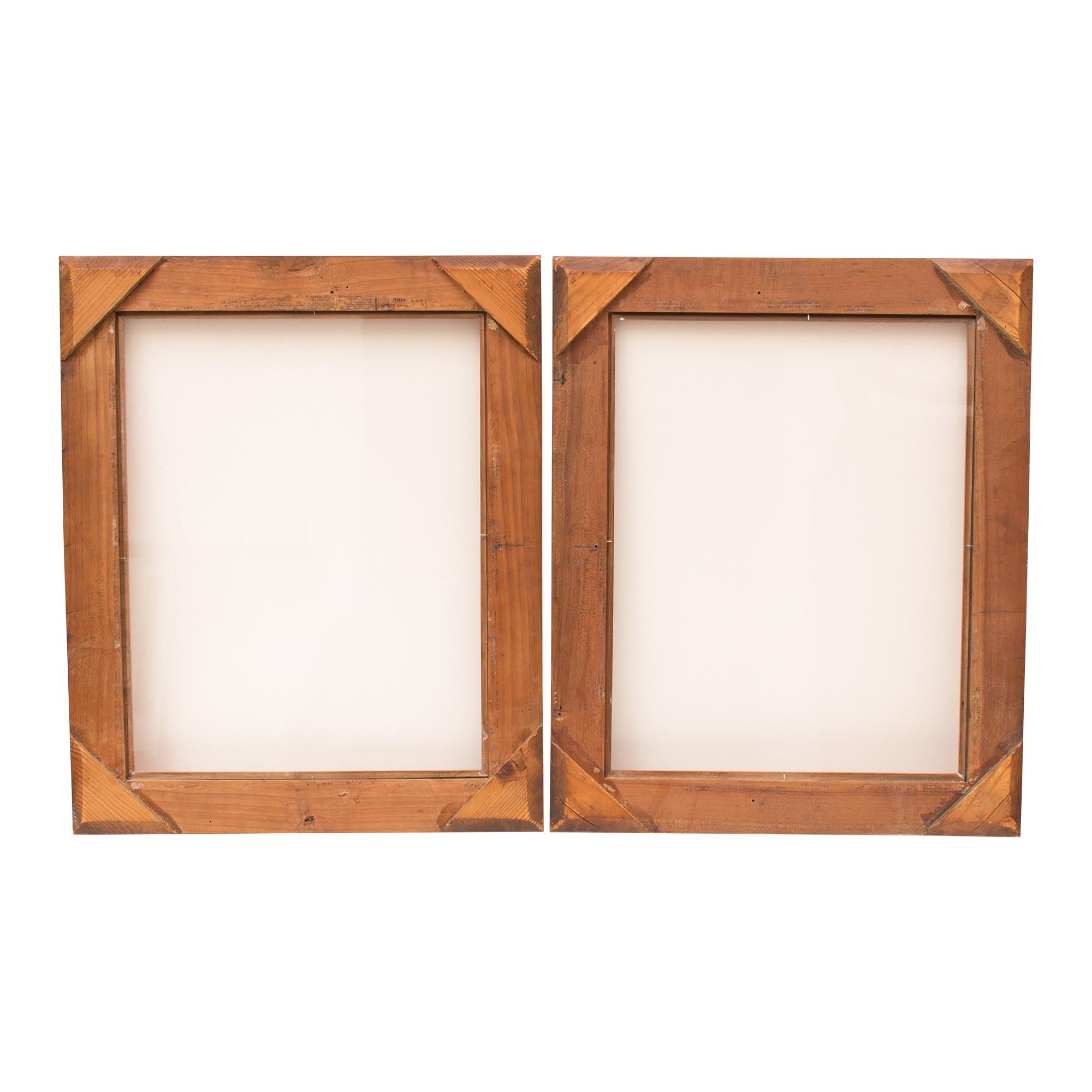 A pair of Biedermeier picture frames hand polished in cherrywood with band inlays all around. The glasses are present in both frames. We can also build mirrors into the frames for you. 

Inner dimensions: 35.8 cm x 45.8 cm.
   