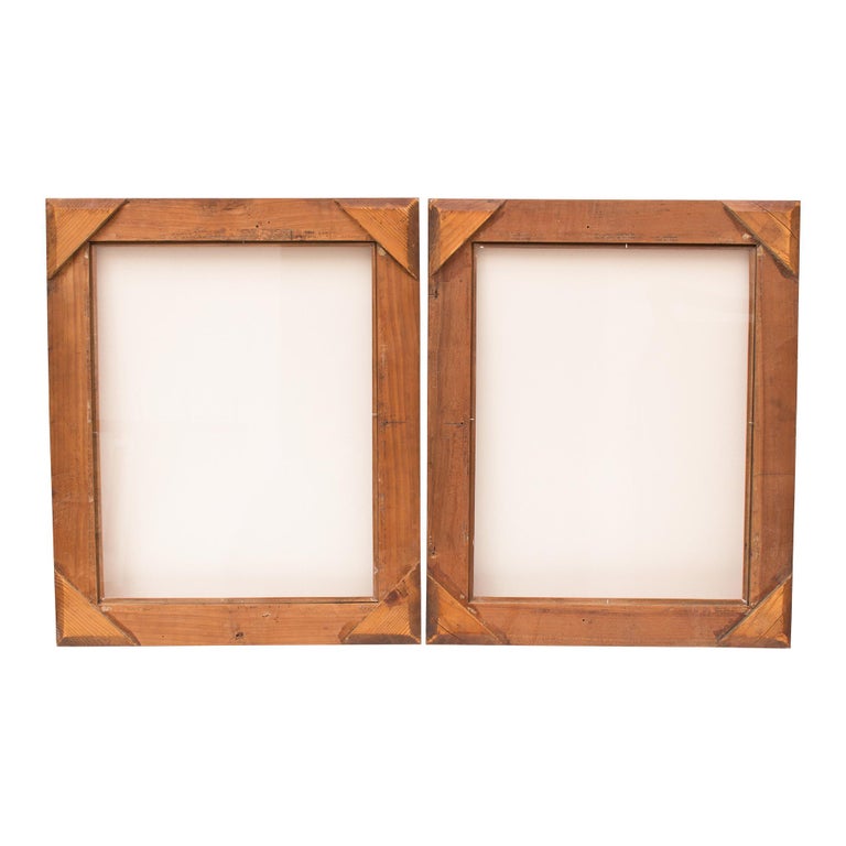 A pair of Biedermeier picture frames hand polished in cherrywood with band inlays all around. The glasses are present in both frames. We can also build mirrors into the frames for you. 

Inner dimensions: 35.8 cm x 45.8 cm.
   