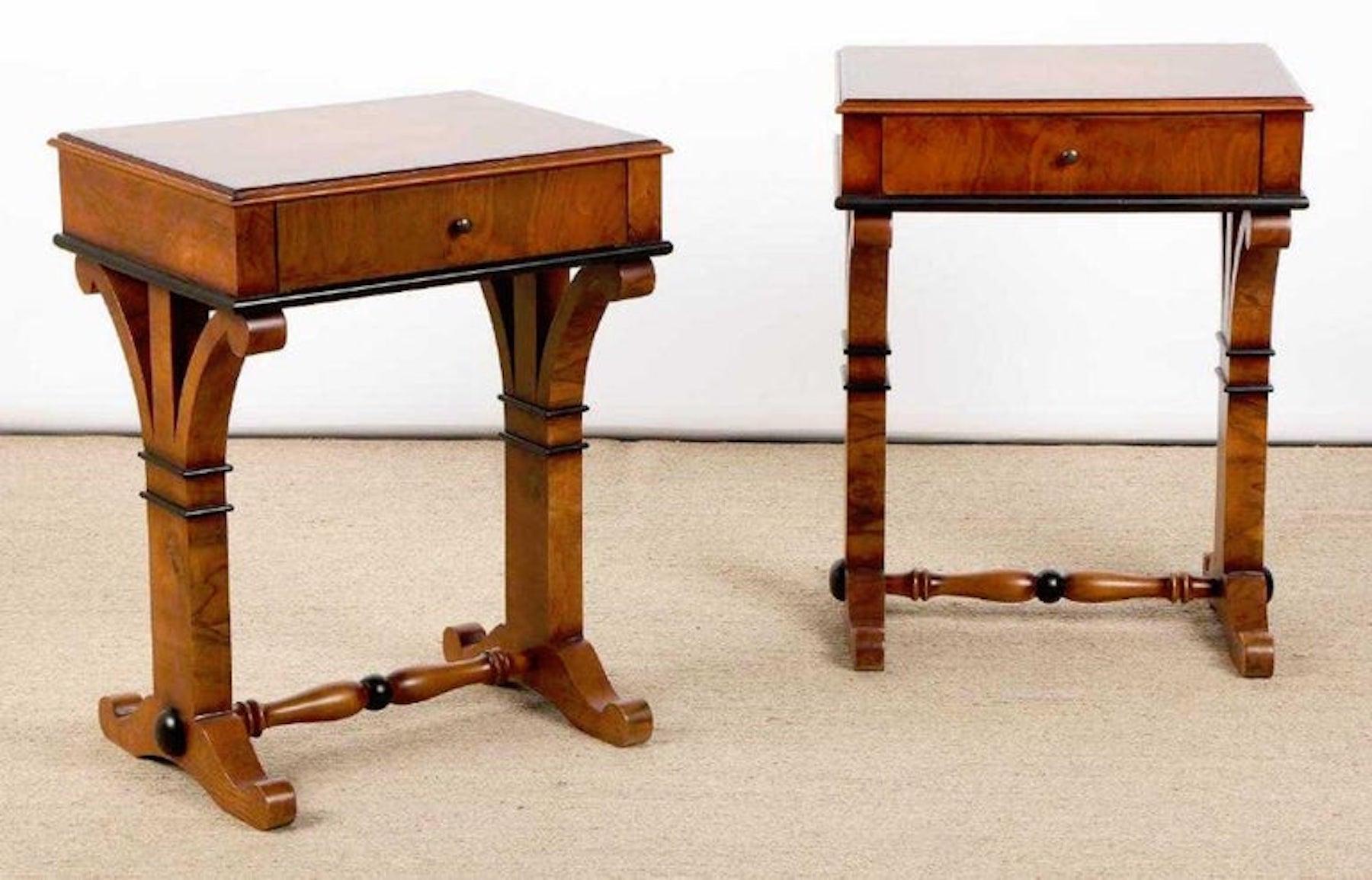Pair of Biedermeier style burl and ebonized end tables or nightstands, each one fitted with one drawer. Beautiful architectural design of figured burl wood, with ebonized details.

 