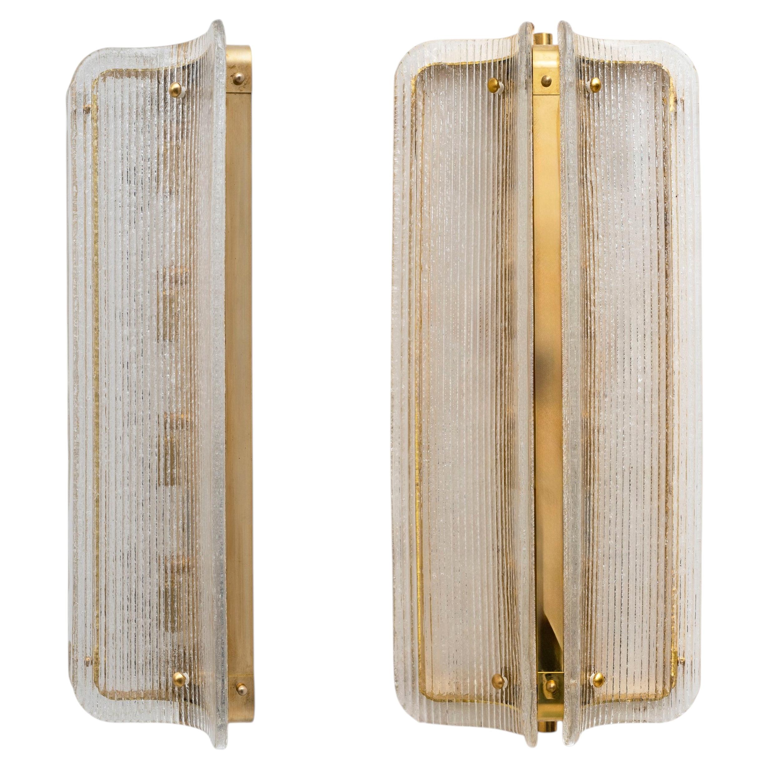 Pair of Large Curved Clear Ribbed Murano Glass and Brass Wall Sconces