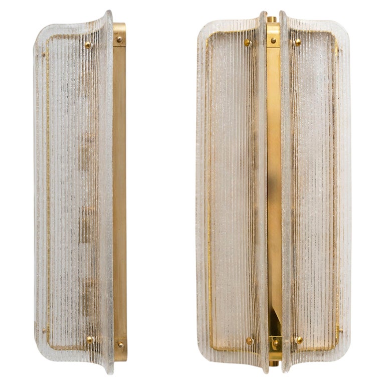 Pair of Large Curved Clear Ribbed Murano Glass and Brass Wall Sconces