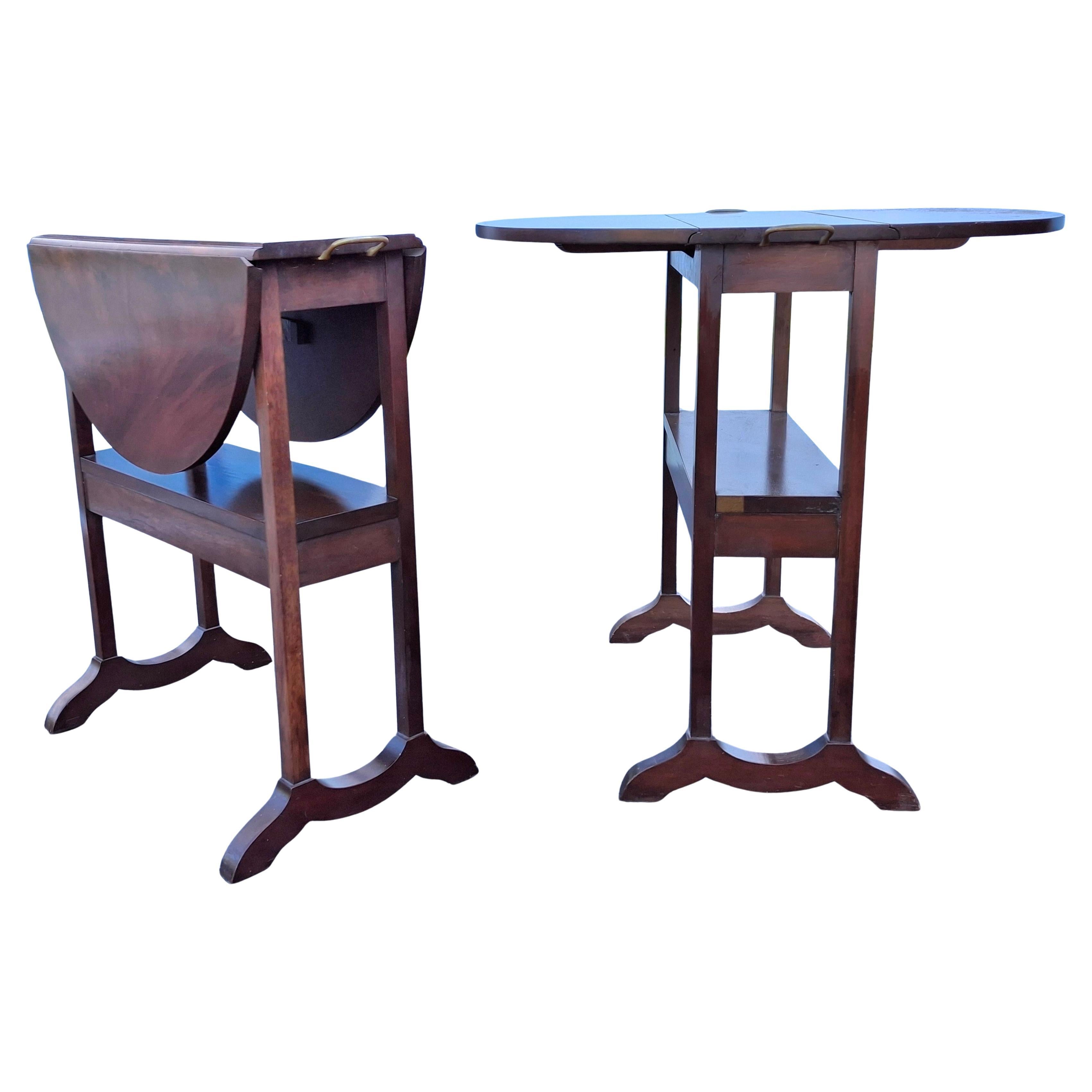 Pair of Biggs Furniture Regency Style Mahogany oval Drop-Leaf Serving Tables. Very sturdy table.
Measures 26