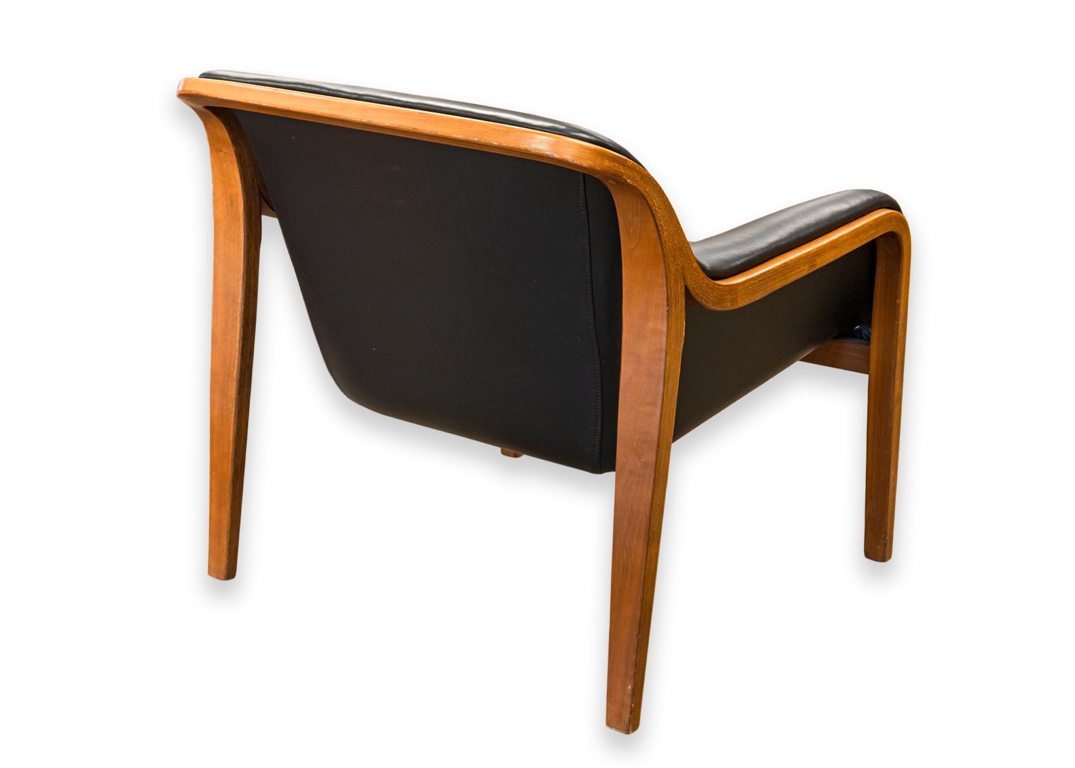 Mid-Century Modern Pair of Bill Stephens for Knoll Black Leather and Wood Mid Century Armchairs