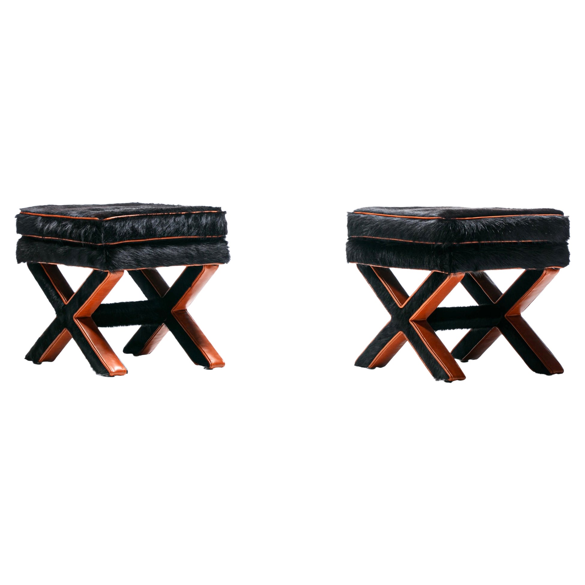 Pair of Billy Baldwin Style X Stools in Black Cowhide 
Cognac Leather c. 1970s For Sale