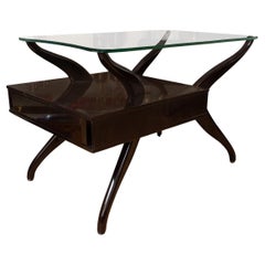 Pair of biomorphic ebonized wood side tables