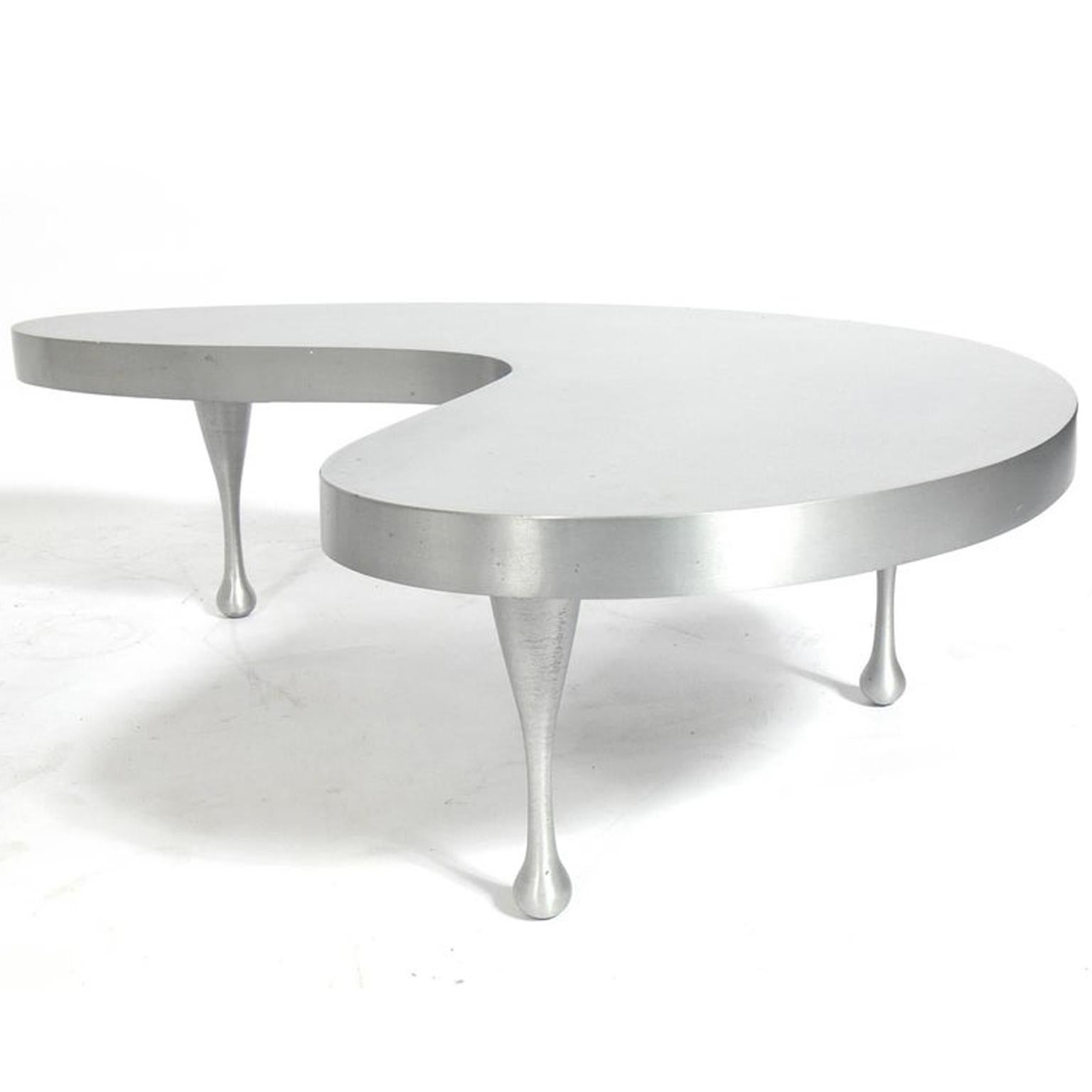 Pair of biomorphic low slung cast aluminum tables, designed by Frederick Kiesler in the 1930s, these are a re-edition made in conjunction with Lillian Kiesler for the Jason McCoy Gallery, circa 1990s. The larger table measures 25.4 H x 87.63 x 57.15