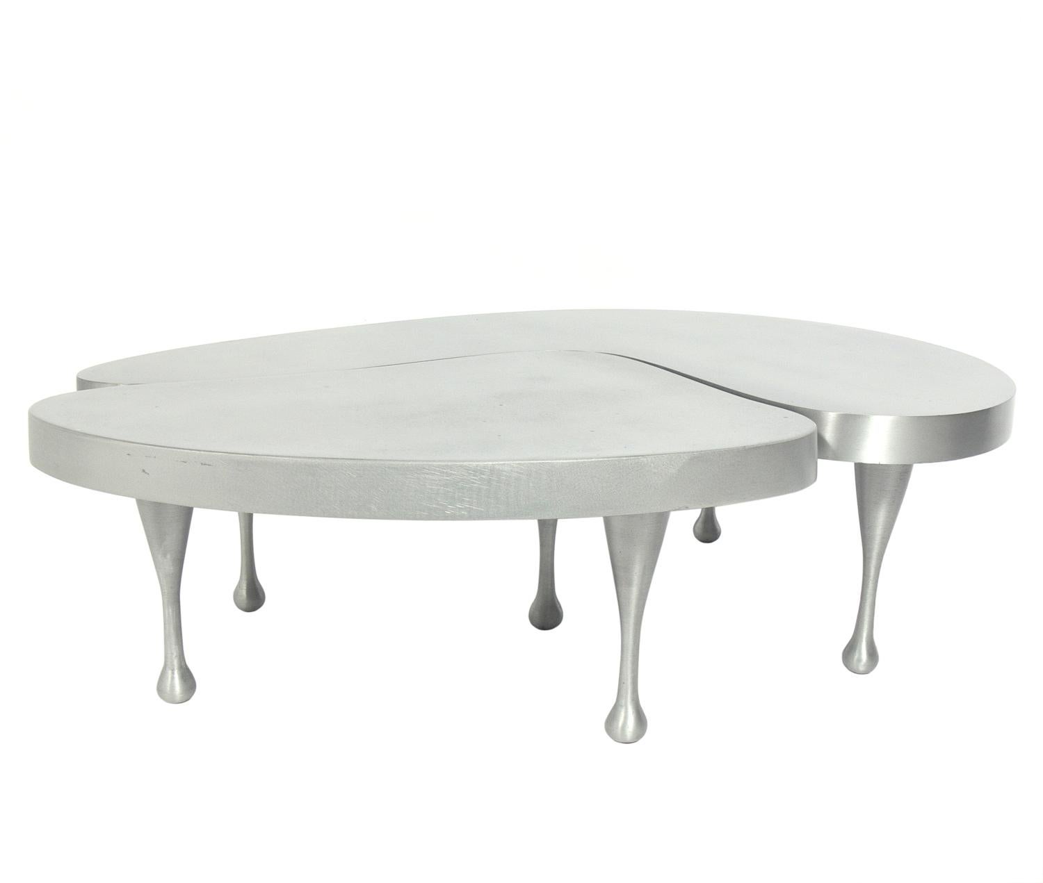 Pair of Biomorphic low slung cast aluminum tables, designed by Frederick Kiesler in the 1930s, these are a re-edition made in conjunction with Lillian Kiesler for the Jason McCoy Gallery, circa 1990s. The larger table measures 10
