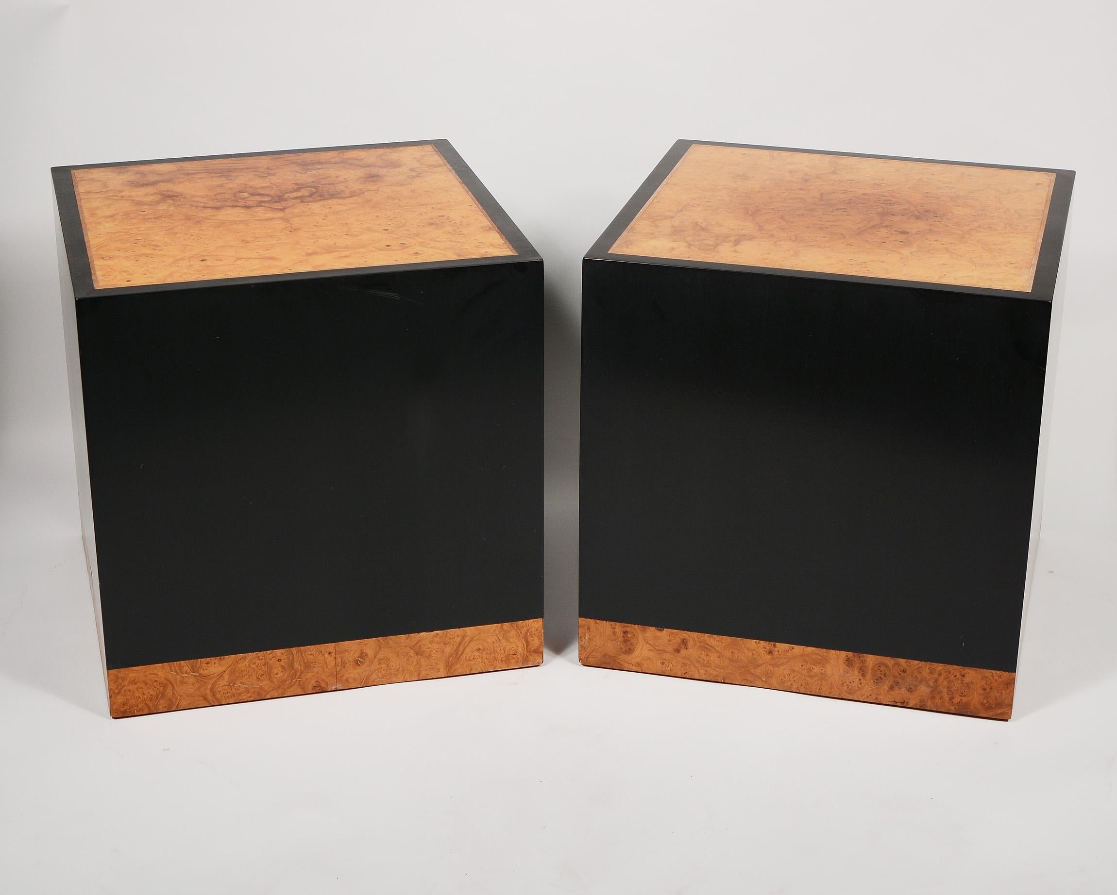 Cube side tables or pedestals made by Dunbar. Edward Wormley designed these unusual and uncommon tables. These have a birds eye maple burl top and band along the bottom. The black is a resin material. The maple inset in the top has a clear resin