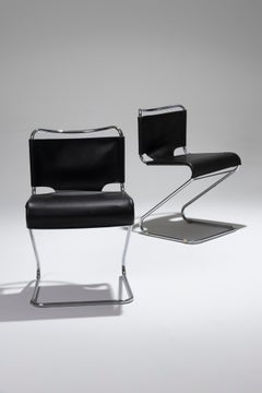 Pair of "Biscia" leather chairs by Pascal Mourgue, 1960