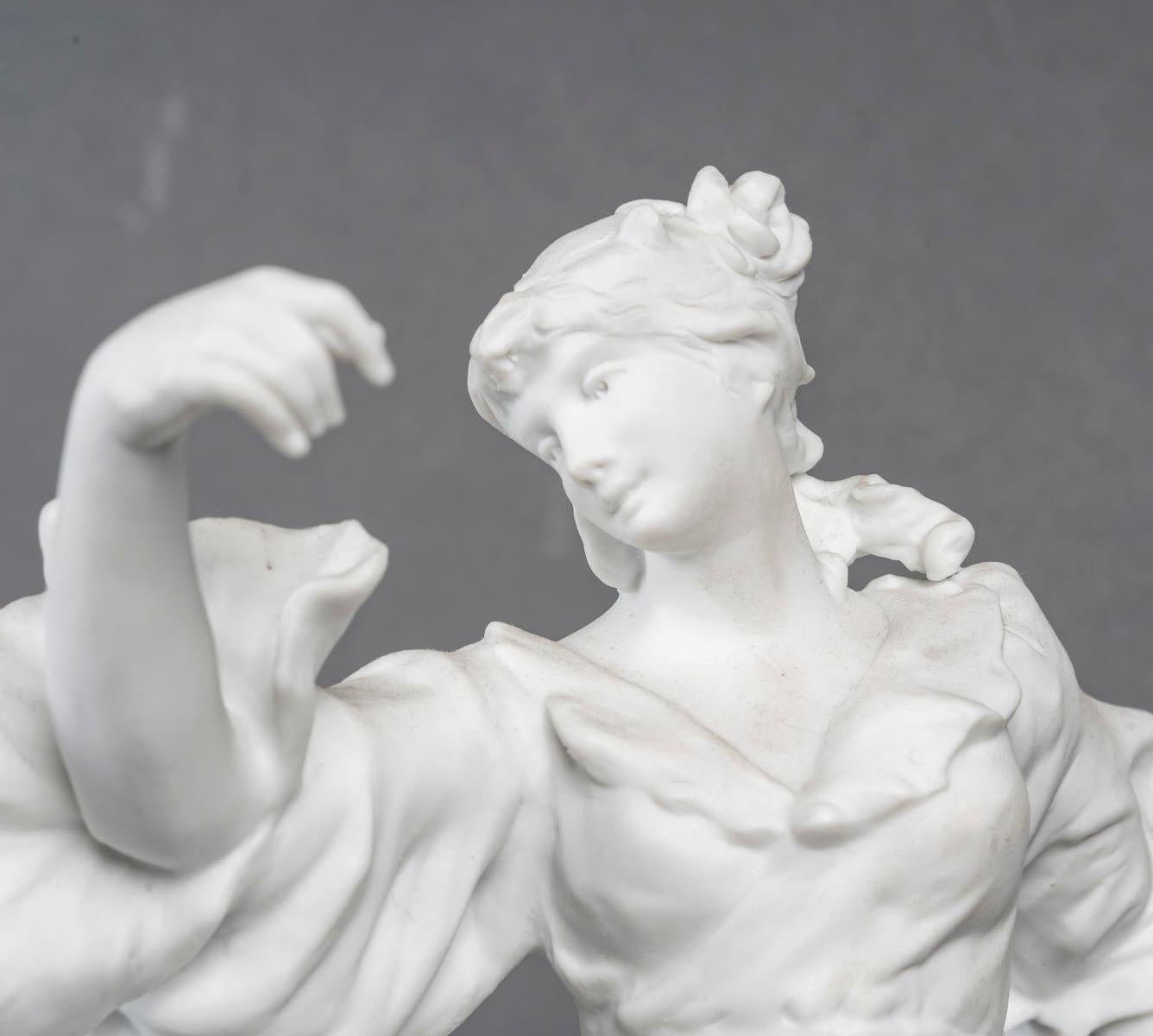 Pair of biscuit sculptures, 1900, on an attractive gilded carved wood base.

A pair of biscuit sculptures of dancers in Art Nouveau dress, 1900, on a gilt carved wooden base, work of Paris or Limoges.
Sculptures: H: 33cm, W: 22cm, D: 12cm
Plinths: