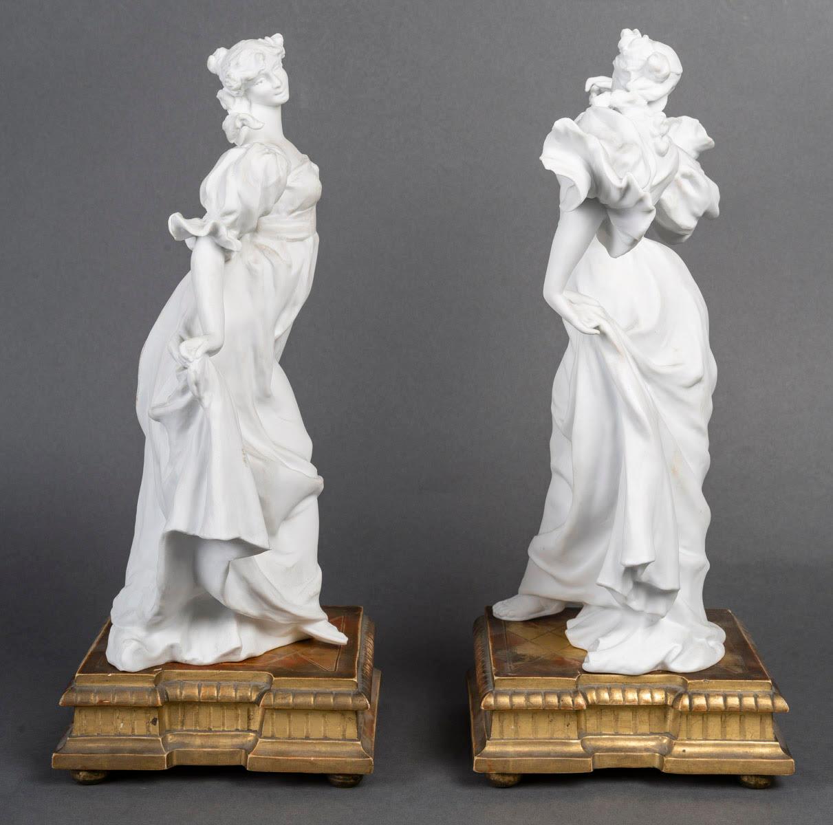 French Pair of Biscuit Sculptures, 1900, on an Attractive Gilded Carved Wood Base. For Sale