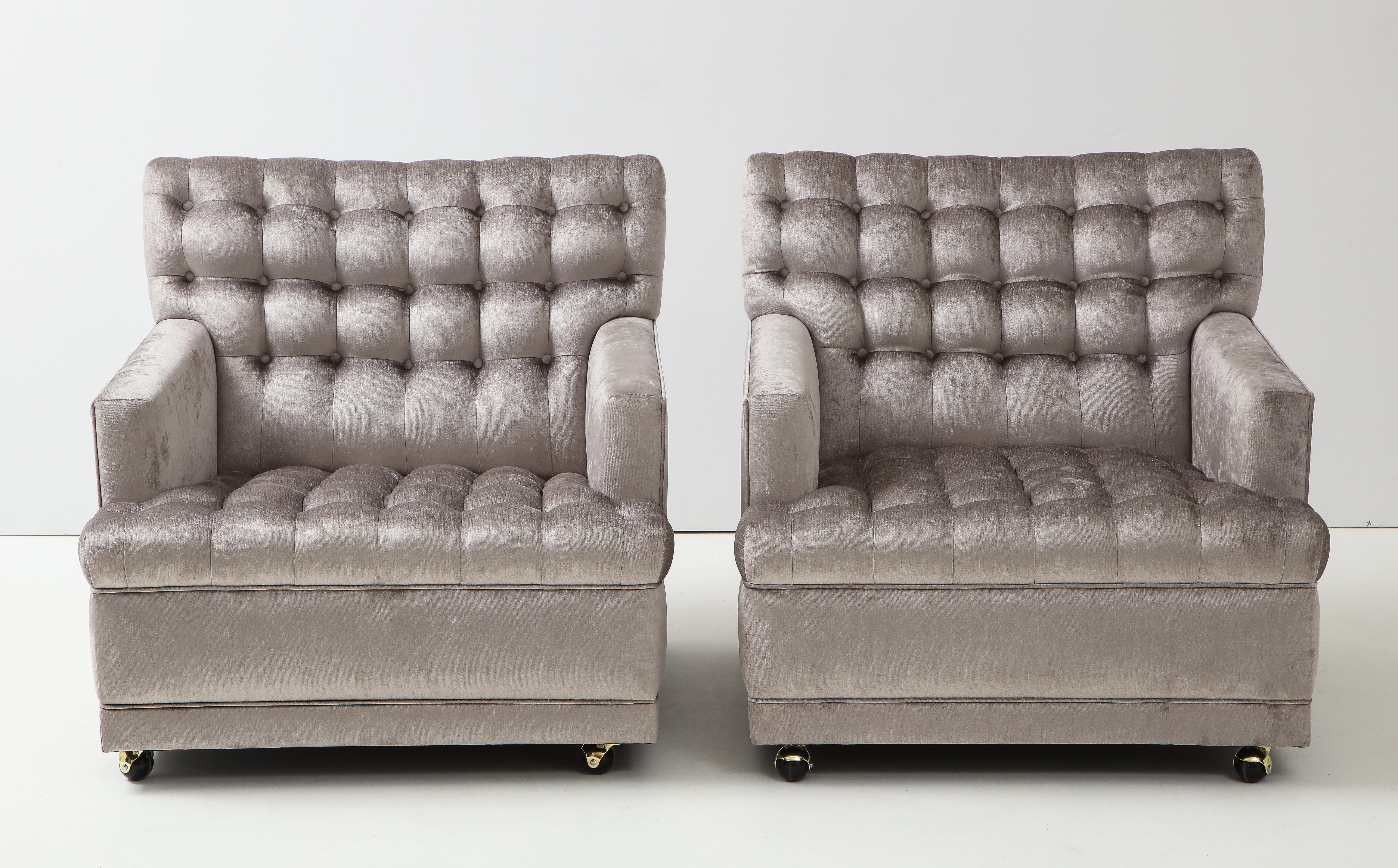 Hollywood Regency Pair of Biscuit Tufted Club Chairs.