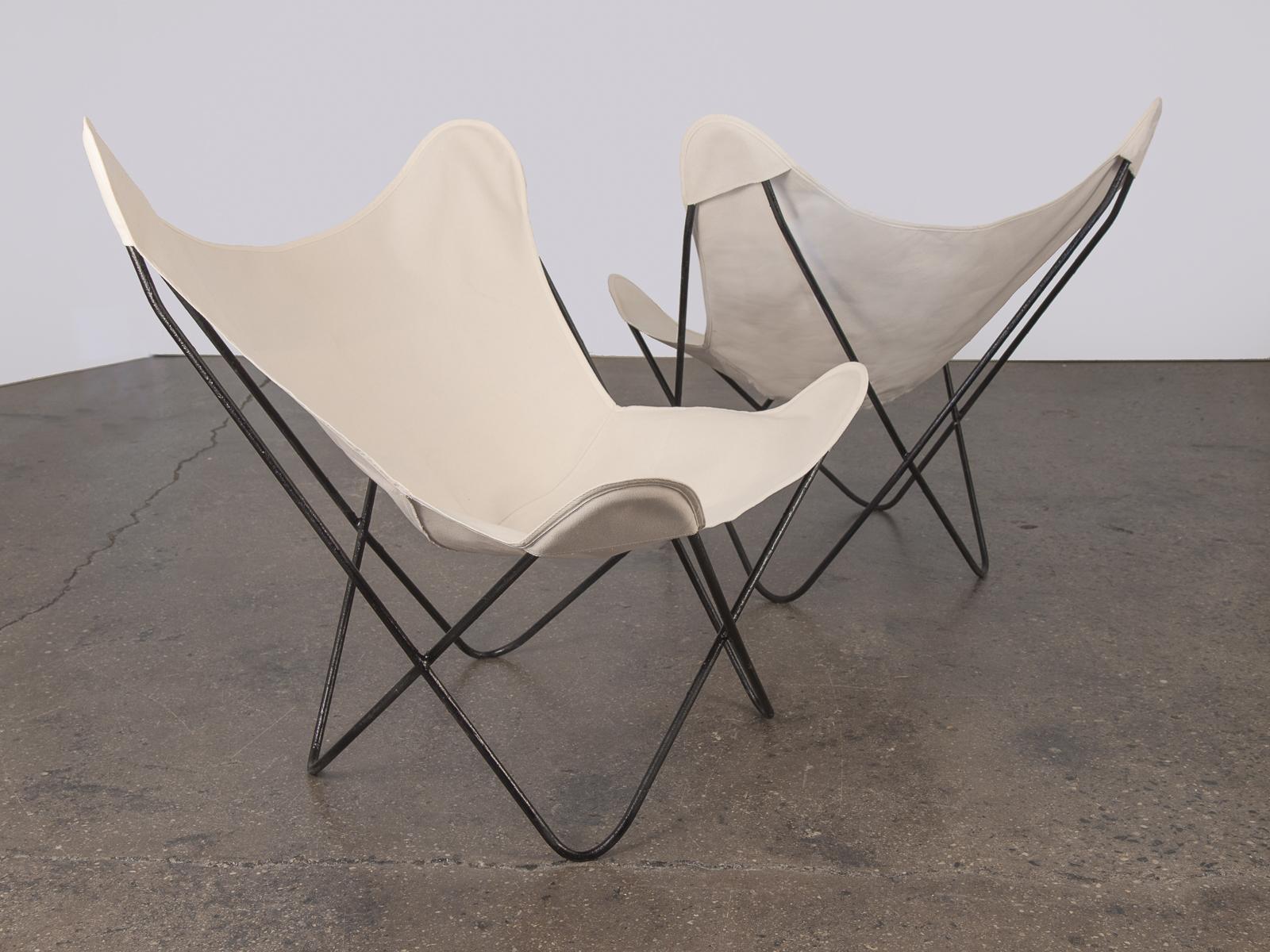 BKF Hardoy butterfly chairs for Knoll. Dynamic classic form, for indoor or outdoor use. New canvas slings fit nicely on the original knoll metal frames. Pairs available in either cobalt blue or natural canvas.