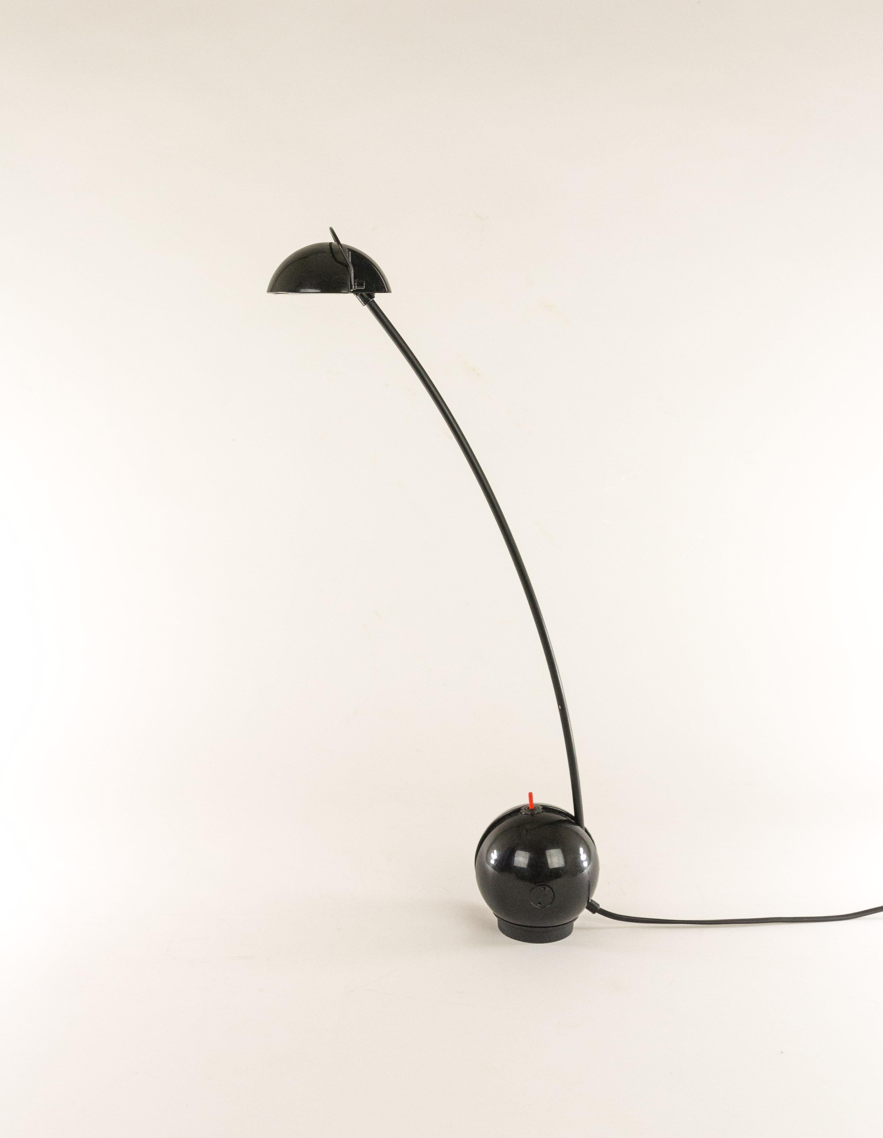 Pair of black Alina table lamps produced by Italian manufacturer Valenti. Playful lamp with ingenious system that allows for adjustment in different positions.

The spherical base contains the transformer and rests on a separate holder that is