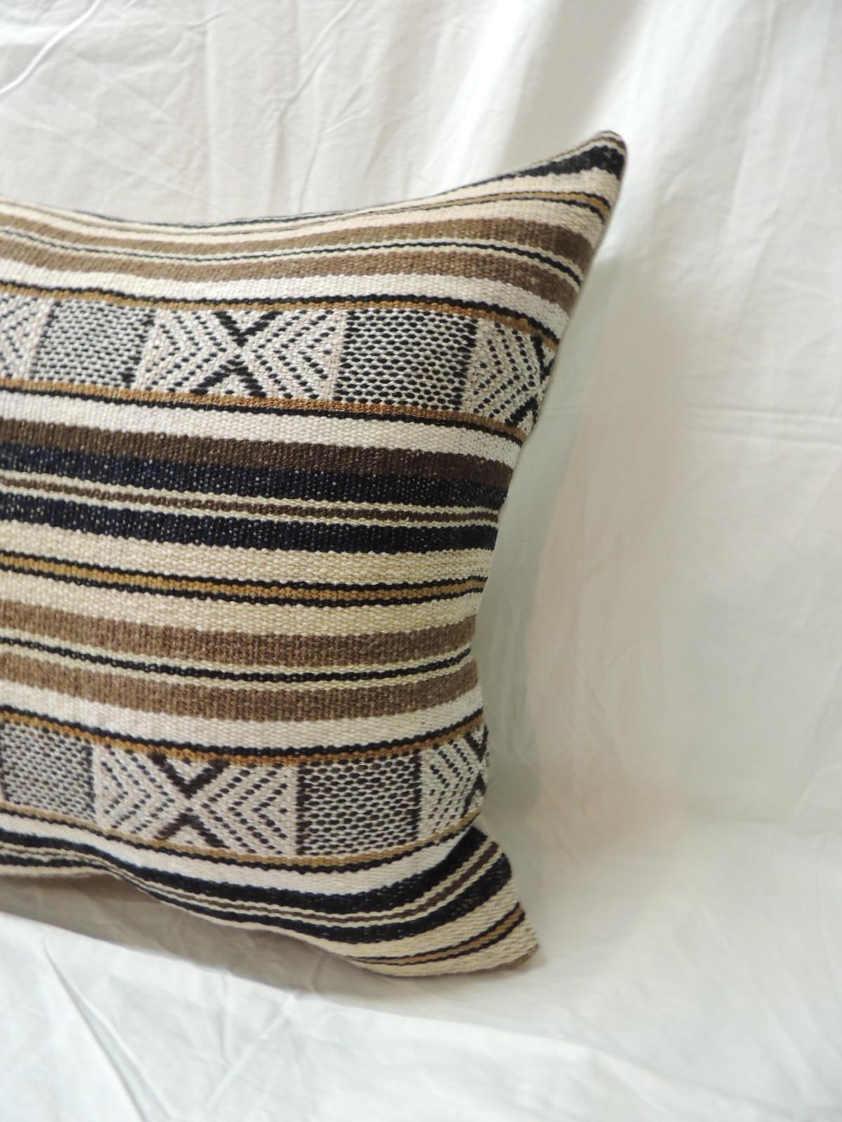 Pair of black and brown woven square decorative pillows with sand color linen backings.
Decorative pillow handcrafted and designed in the USA. Closure by stitch (no zipper closure) with custom made pillow insert.
Size: 20