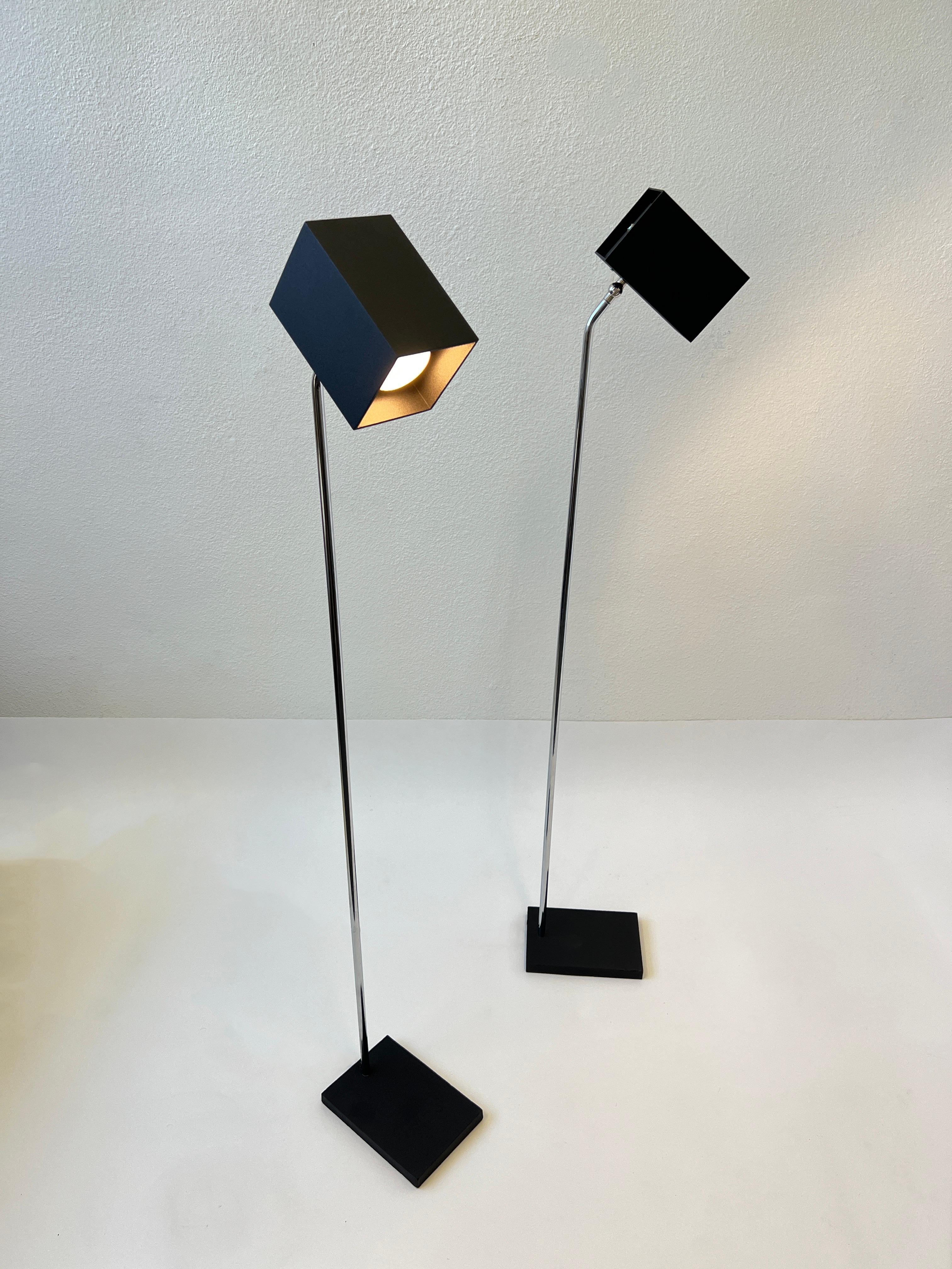 1960s pair of polish chrome and black textured powder coated reading floor lamps design by Robert Sonneman for Kovacs. Newly rewired, On/Off rotating switch on shade.
It takes a regular 75w Max Edison lightbulb.
Measurements: 49” high 8” wide and