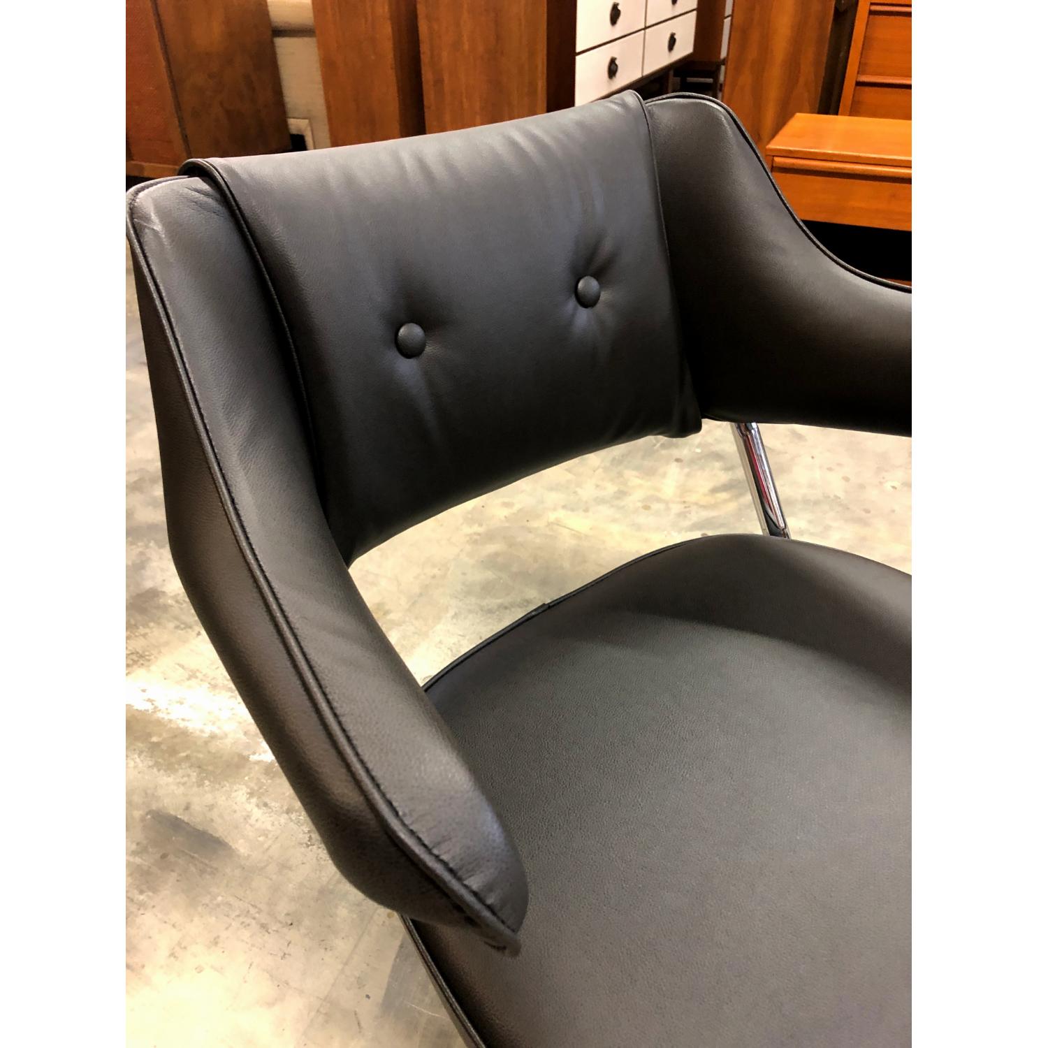 Faux Leather Pair of Black and Chrome Swivel Task Armchairs