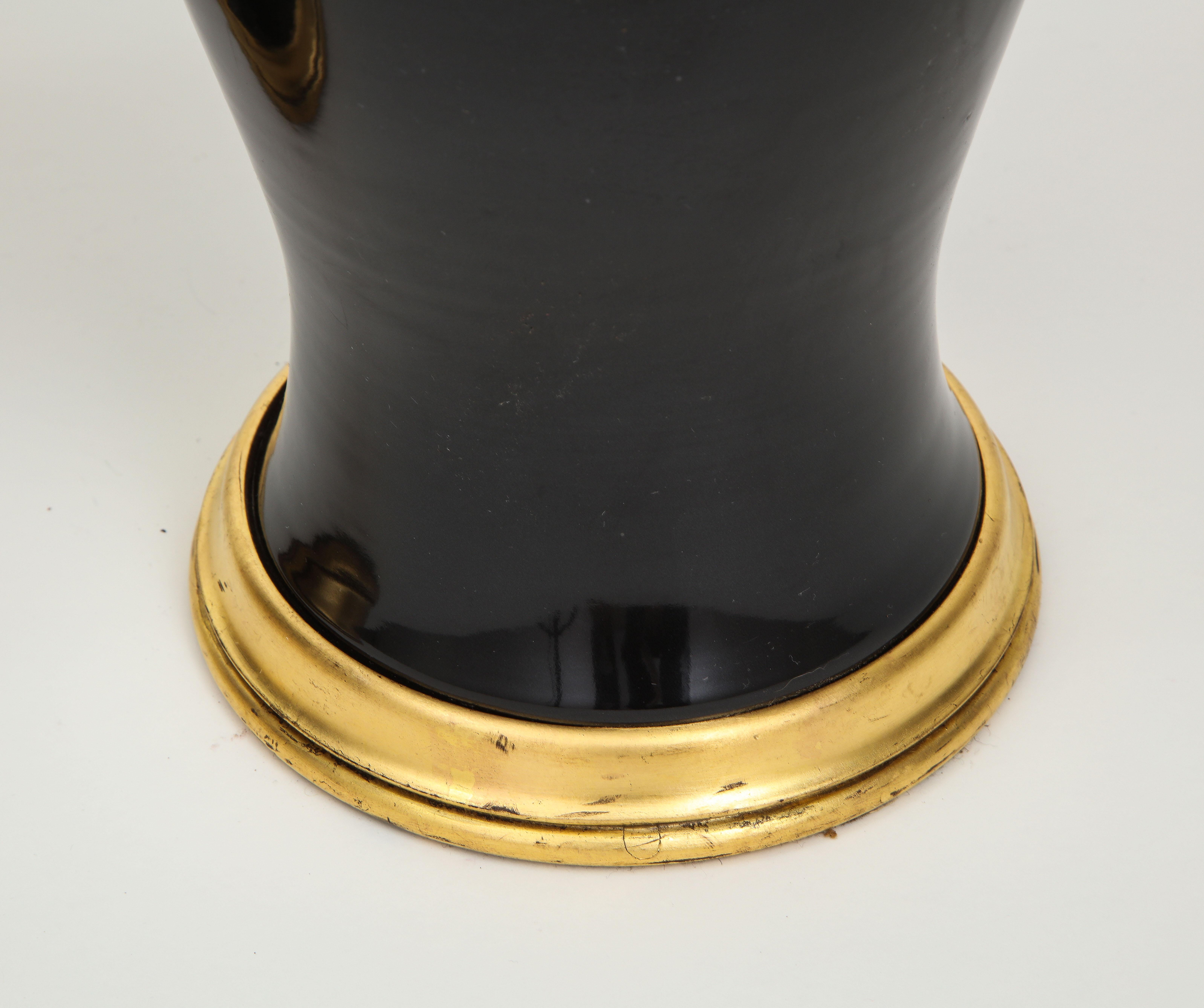20th Century Pair of Black and Gilt Ceramic Vase Lamps
