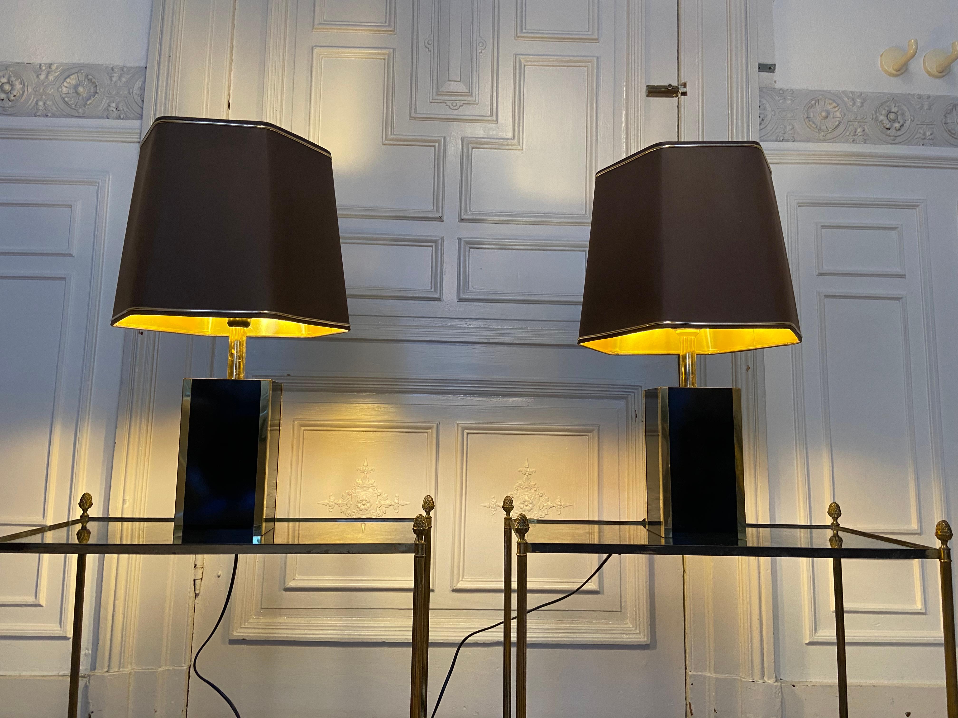 Pair of black and gold lacquered lamps, 1980s.
