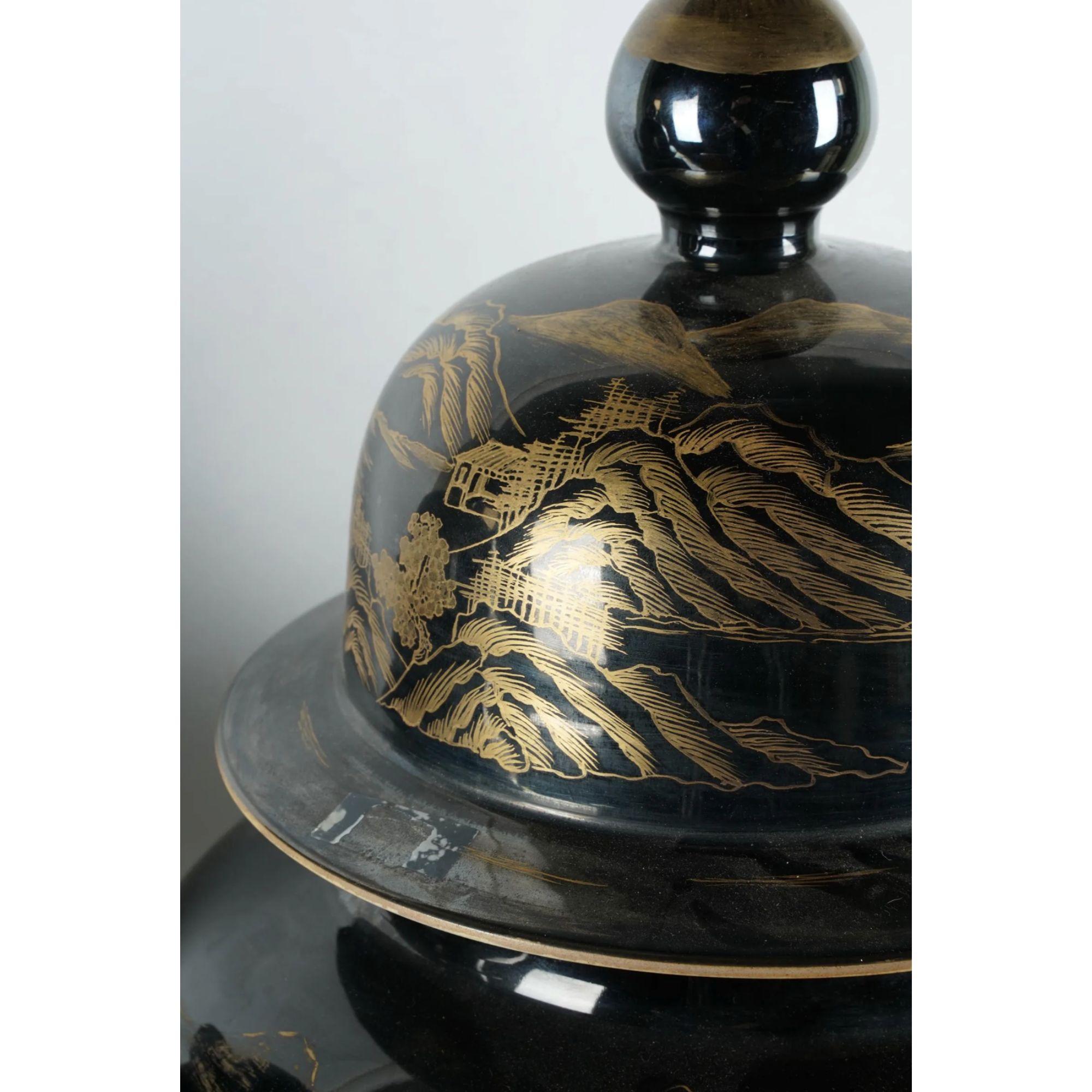 Pair of two Black and Gold porcelain covered temple jars.