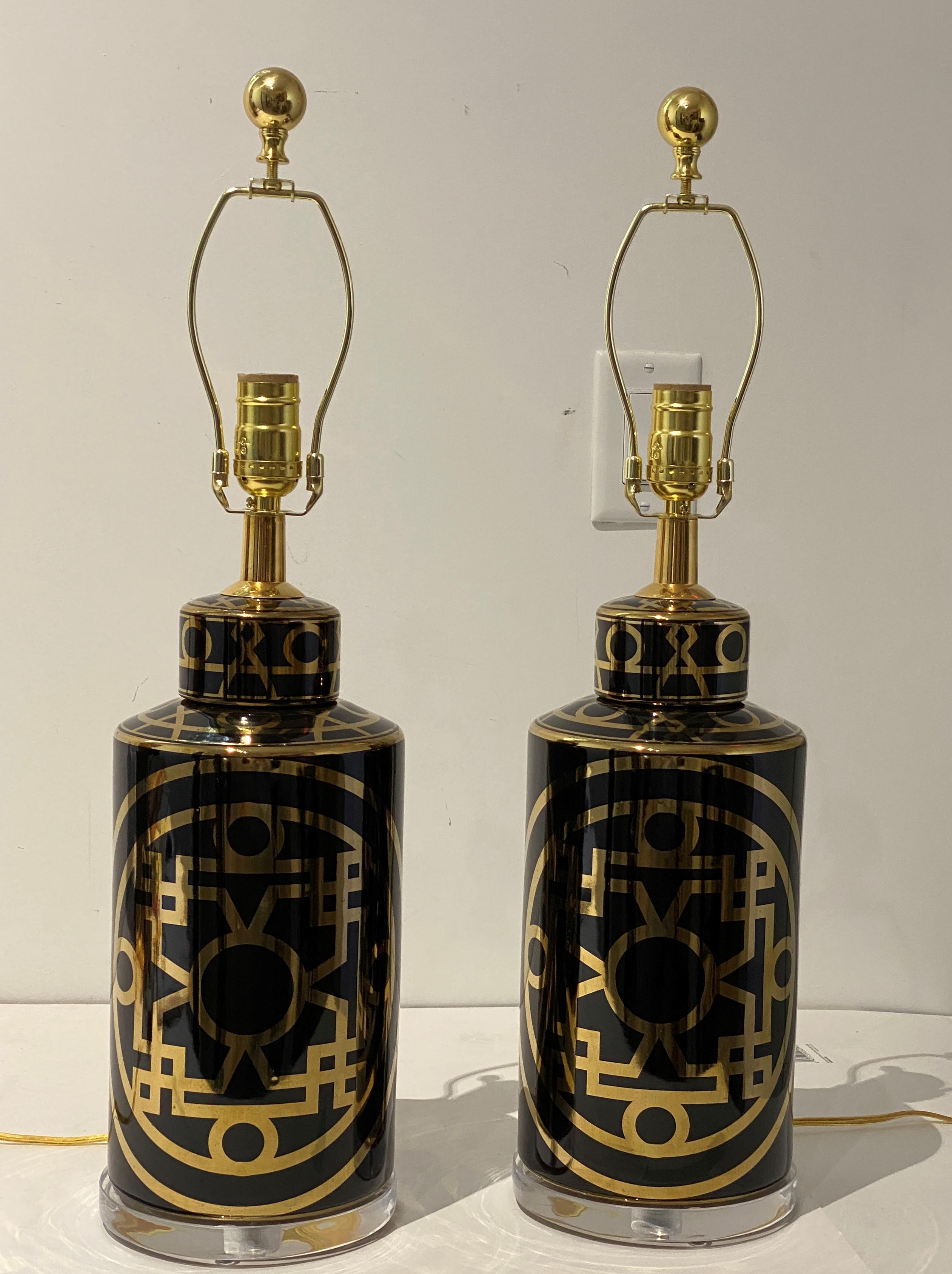 New custom shades are available and can be shipped with the table lamp bases.

This stylish and chic pair of table lamps have that Hollywood Regency vibe, with their black and gold coloration and stylized Chinese symbols. 

Note: Heigth to top
