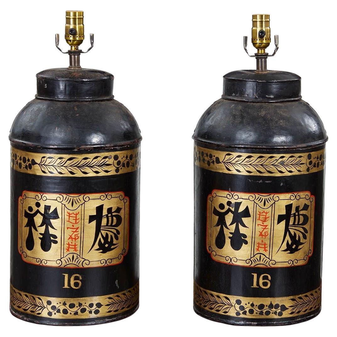 Pair of Black and Gold Tea Tin Lamps For Sale