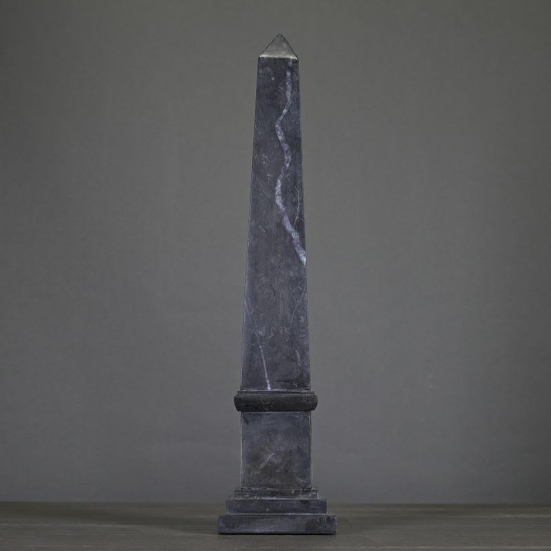 Pair of black and grey marble obelisks in the Napoleon III style, 20th century.

Pair of Napoleon III style obelisks, 20th century, in black and grey marble.
H: 51cm, W: 11cm, D: 11cm