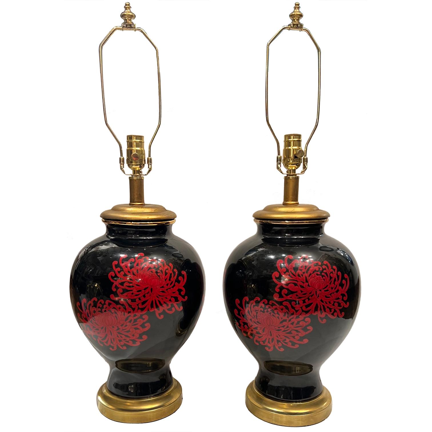Pair of 1950's French lamps with Chrysanthemum flowers on a black background.

Measurements:
Height of body: 17.75