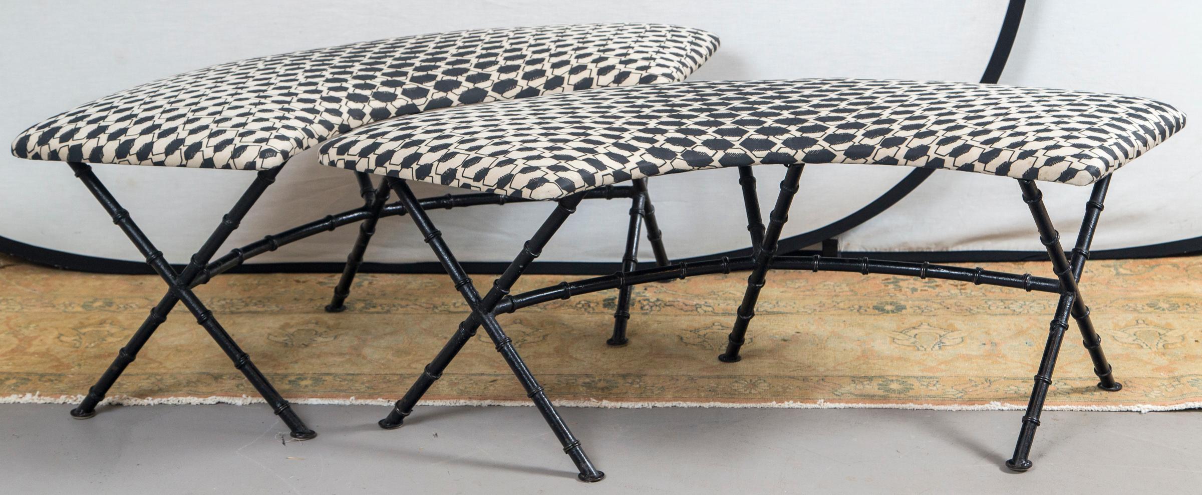 Pair of black and white French demilune iron benches recovered in Fortuny fabric.