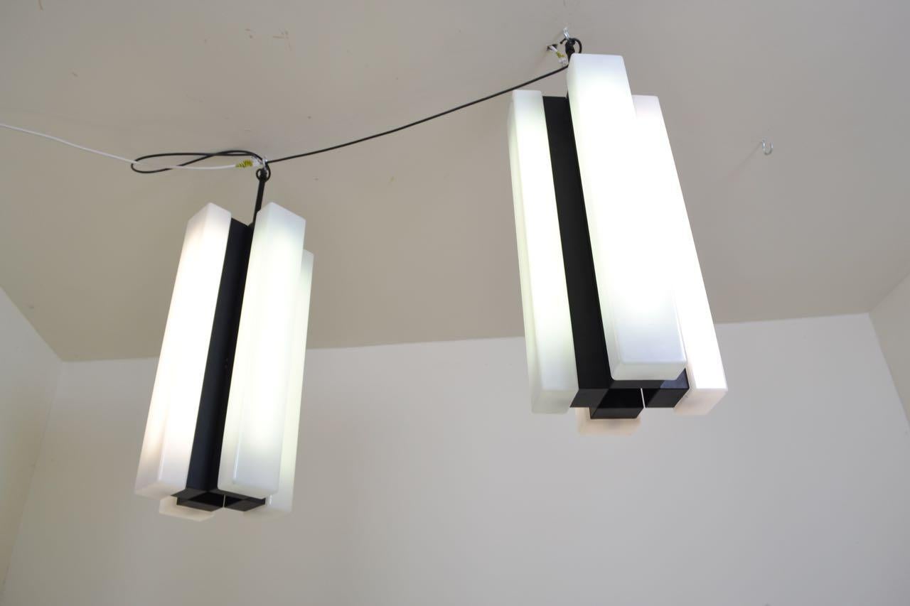 Acrylic Pair of Black and White Modernist Pendant Lights, Italy, 1970 For Sale