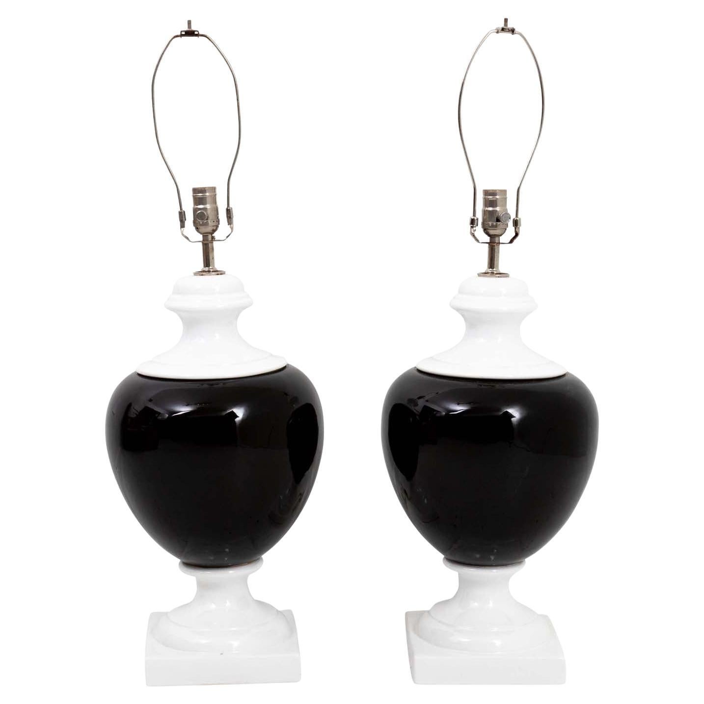 Pair of Black and White Urn Lamps For Sale