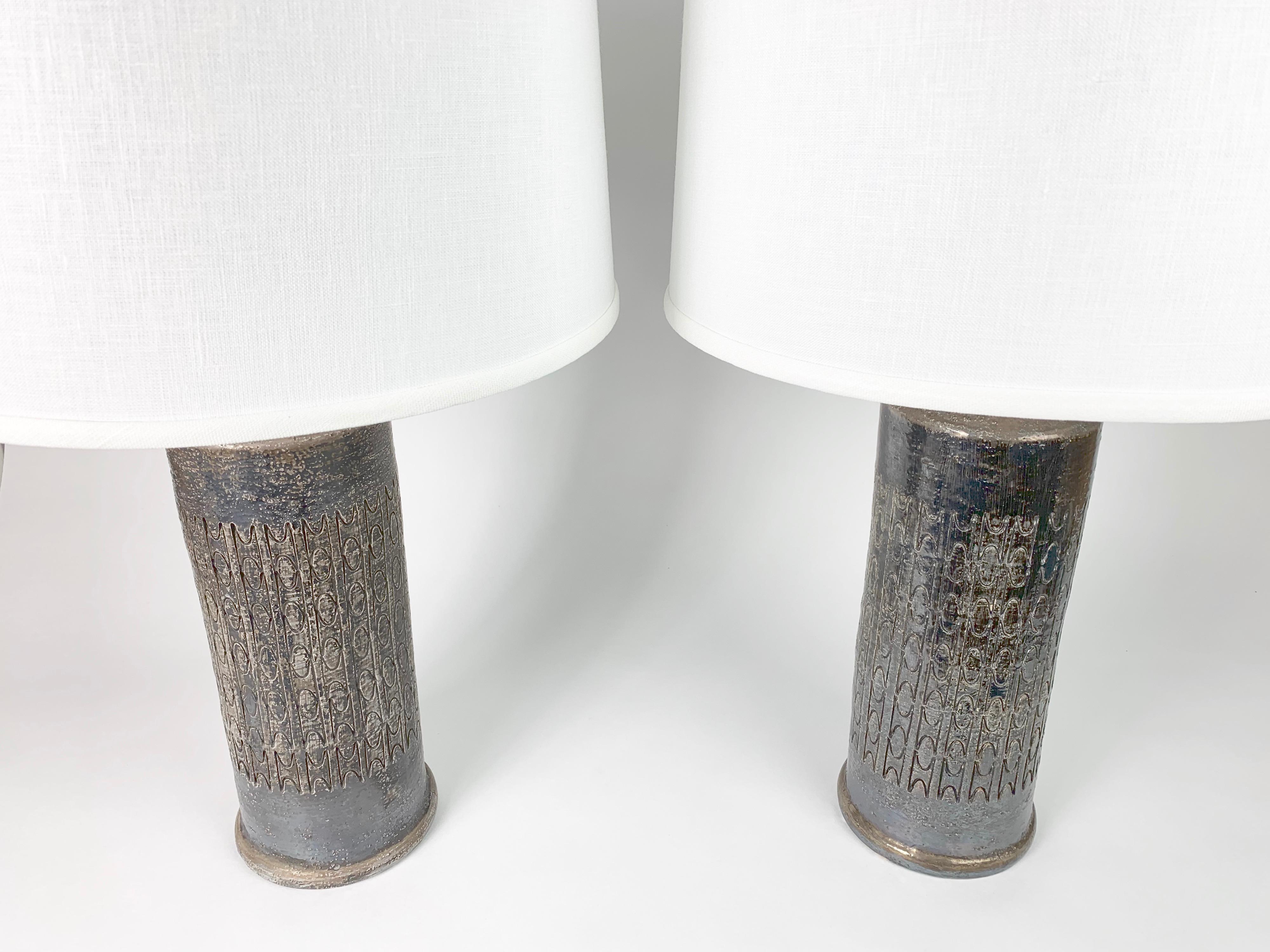 Bitossi lamps Italy 1970s ceramic in a black and silver multi layered glaze with an earthy super sophisticated dark look, signed.
Rewired for the US.

Shades not included.