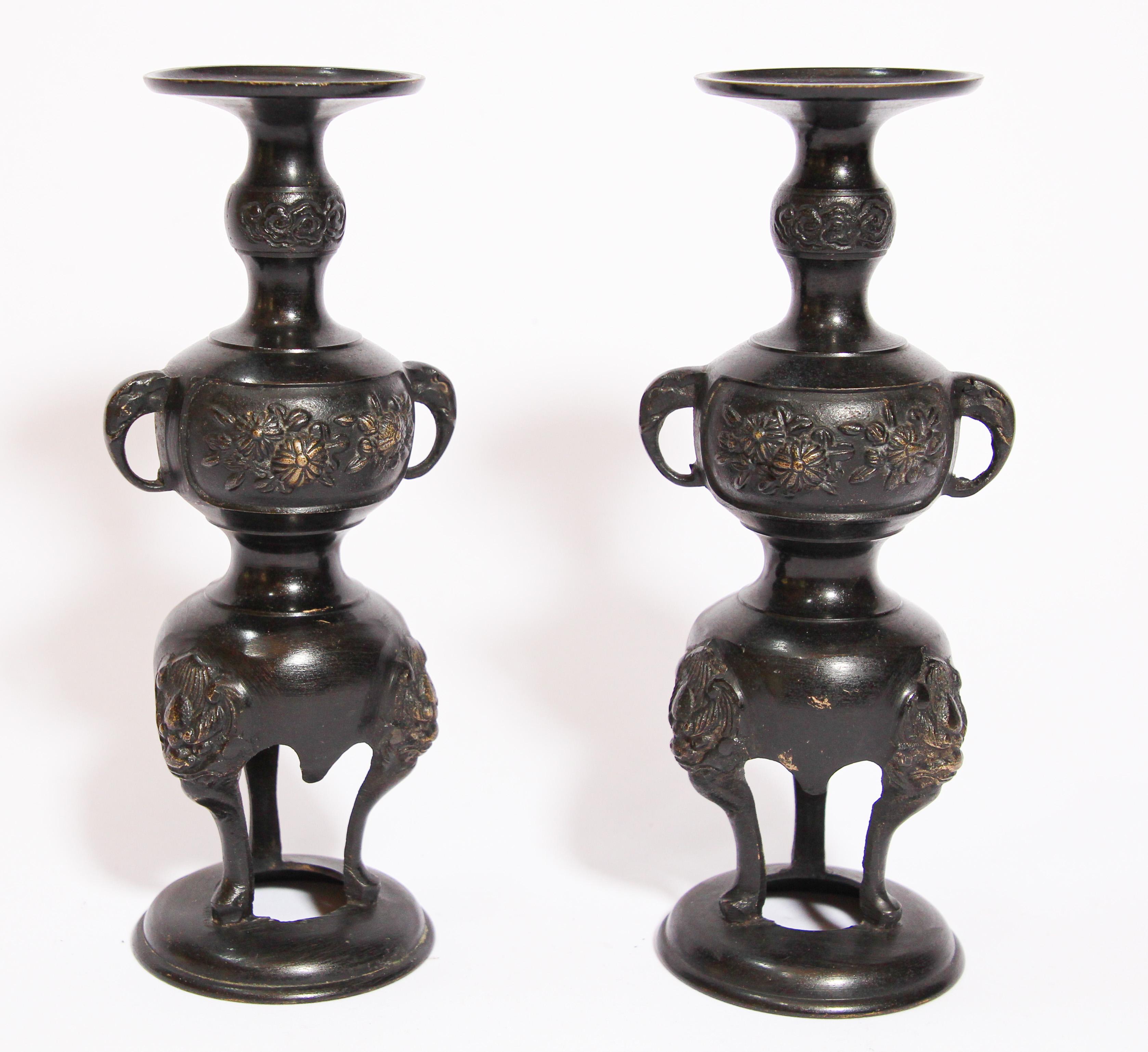 Pair of black cast bronze Japanese candleholders censer.
Oriental antique late 19th century Meiji period Japanese heavy black bronze candlesticks incense burner, censer decorated with Foo dogs, dragon, scenic cartouches depicting various birds and