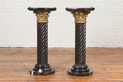 Pareja de Pedestales Torcidos de Mármol Negro de Carrara con Capiteles Corintios de Bronce