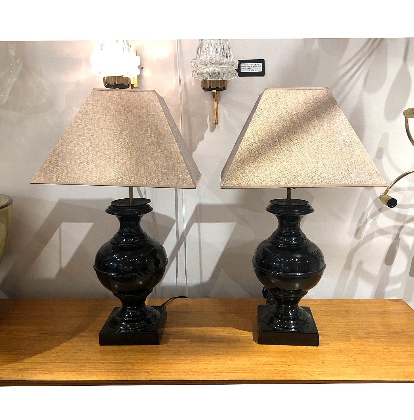 Classic looking Mid-Century Modern black ceramic lamps.
New shades, with metallic luster. Sold together.
France, 1960s.
Signed, unidentified artist.
Dimensions with shades: 14