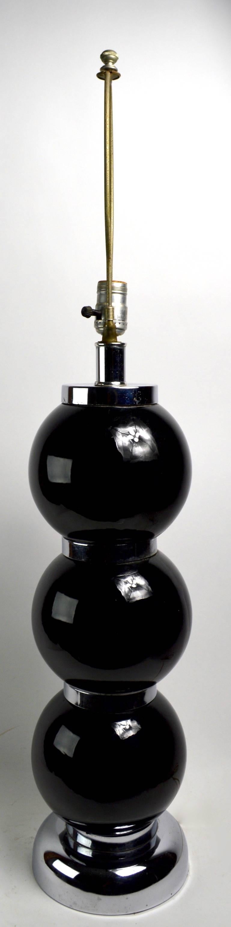 Wonderful graphic stacked ball lamps by George Kovacs. Each lamp has three black ceramic balls (6 inch diameter) with bright chrome spacer disks and chrome base (7 inch diameter). Height to top of socket 26 inches - extremely minor wear to chrome in