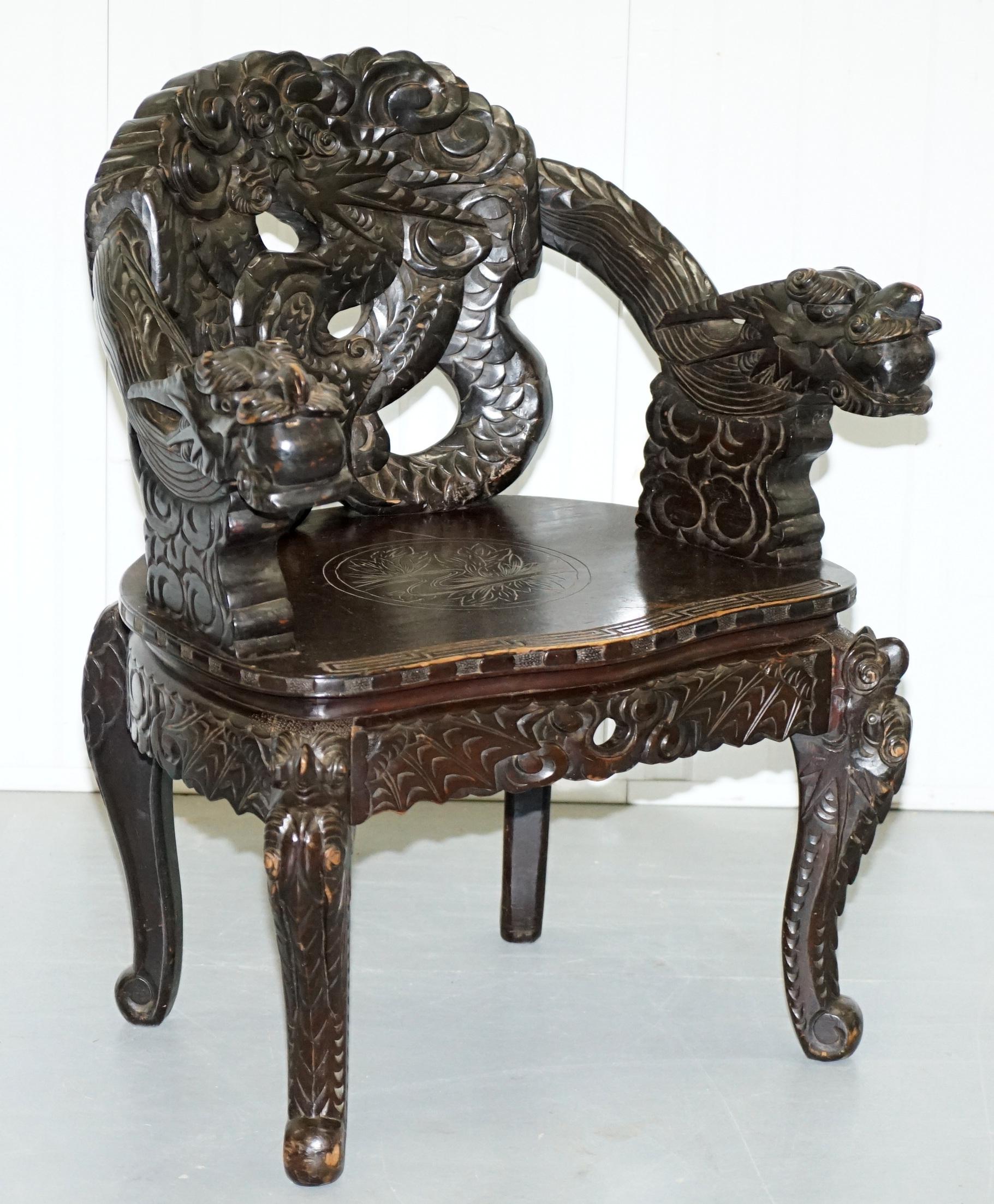 Pair of Black Qing Dynasty Carved Dragon and Lion Foo Dogs Armchairs, circa 1870 6