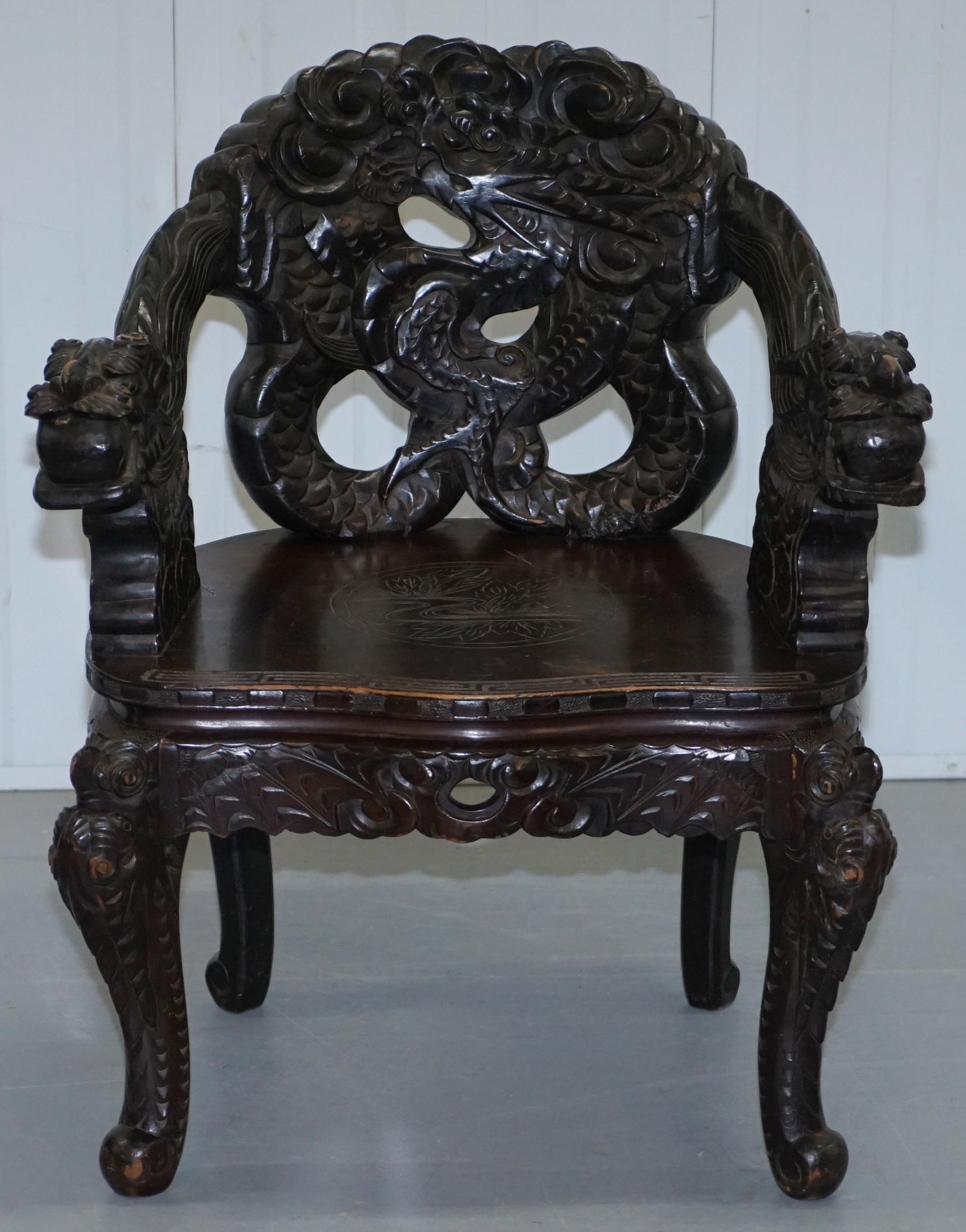 Pair of Black Qing Dynasty Carved Dragon and Lion Foo Dogs Armchairs, circa 1870 7