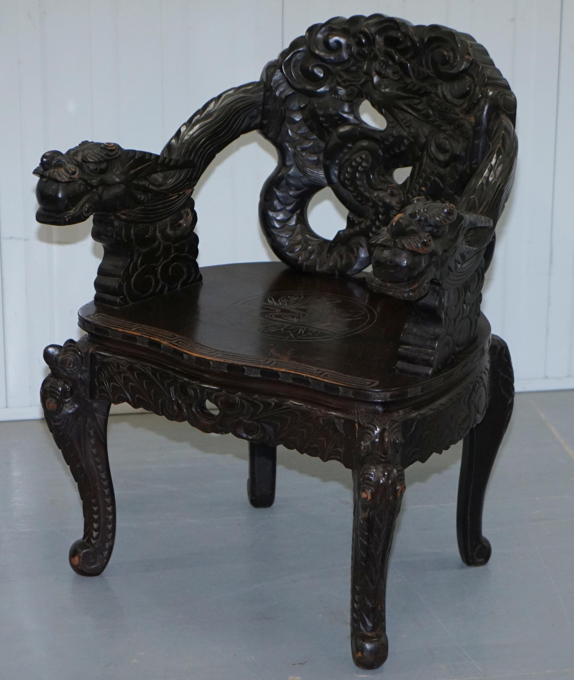 Pair of Black Qing Dynasty Carved Dragon and Lion Foo Dogs Armchairs, circa 1870 8
