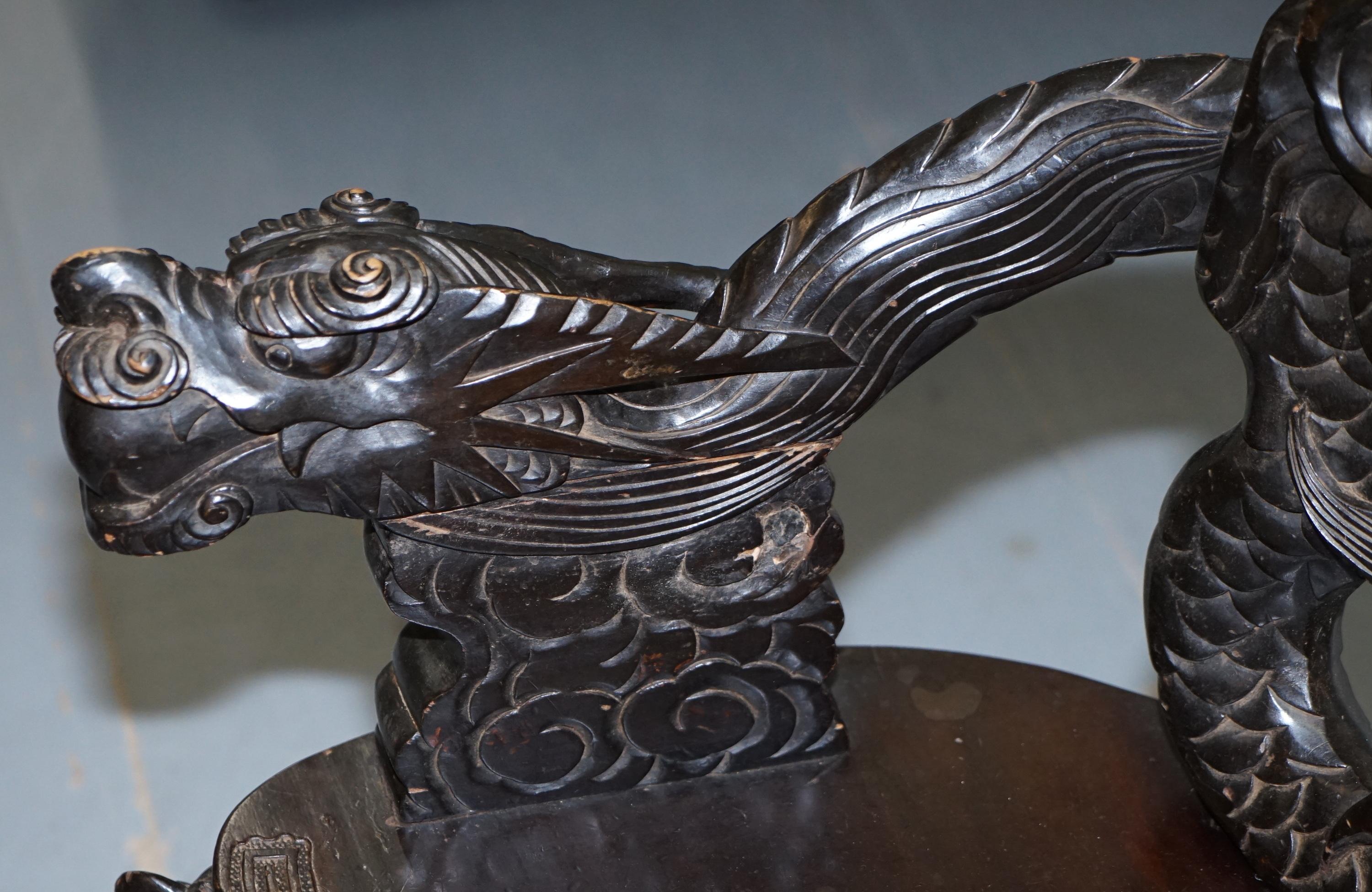 Pair of Black Qing Dynasty Carved Dragon and Lion Foo Dogs Armchairs, circa 1870 11