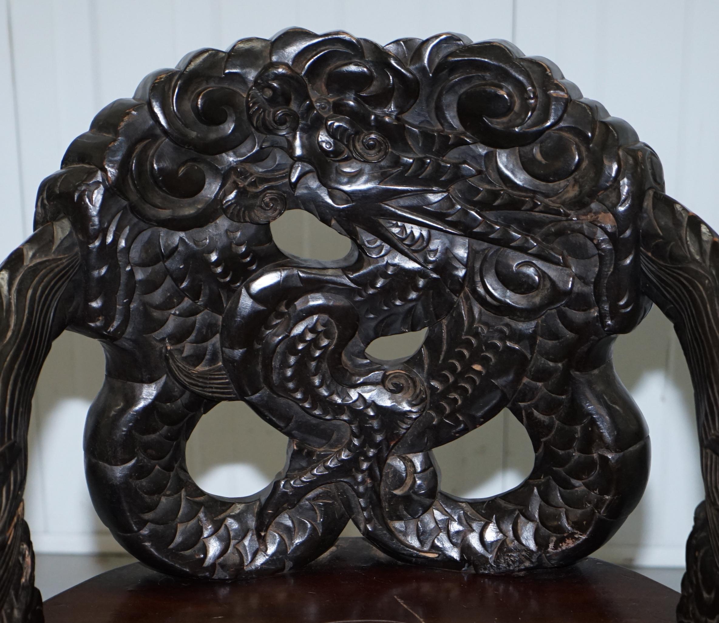 Pair of Black Qing Dynasty Carved Dragon and Lion Foo Dogs Armchairs, circa 1870 12