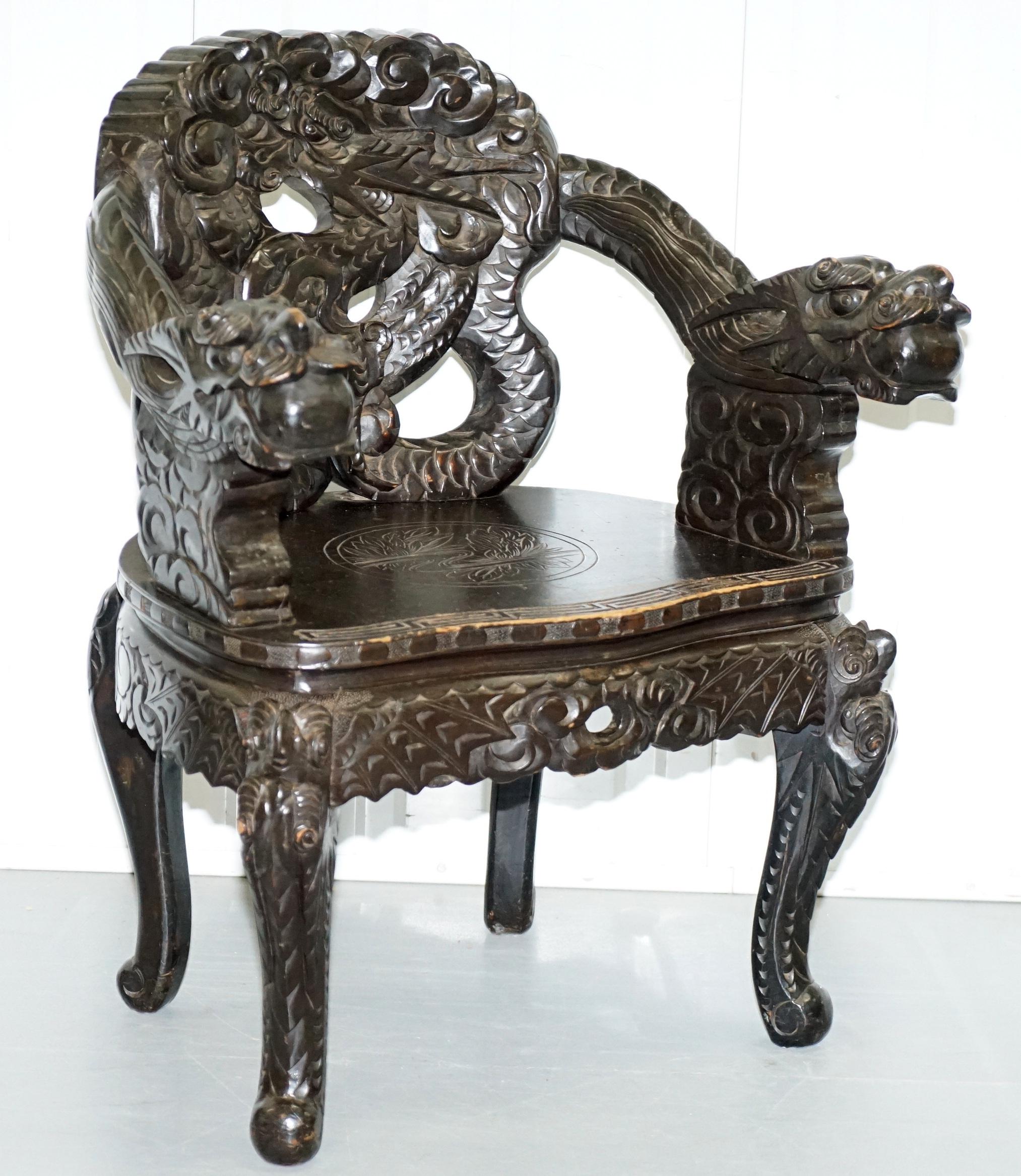 We are delighted to offer for sale this stunning pair of rare Qing dynasty circa 1870 hand carved solid elm ebonised dragon and Lion Foo dog throne armchairs

A really rare an expertly hand carved pair, the detail is never ending and of the